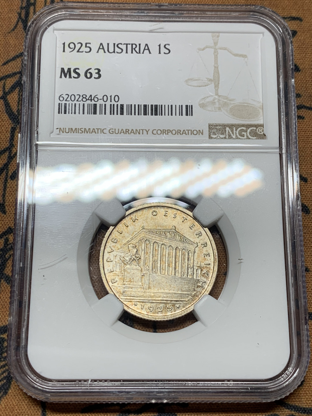 《竞宝斋》第31场（年内尾拍）-周日，周一，周二3场连拍（全场顺丰包邮） NGC-MS63 奥地利 1925年 1先令 小版银币 淡金包浆