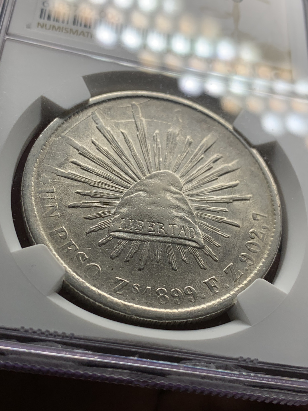 《竞宝斋》第31场（年内尾拍）-周日，周一，周二3场连拍（全场顺丰包邮） NGC AU58 1899墨西哥萨卡特卡斯厂 直边鹰洋（少见厂别）全羽原光 品相相当漂亮