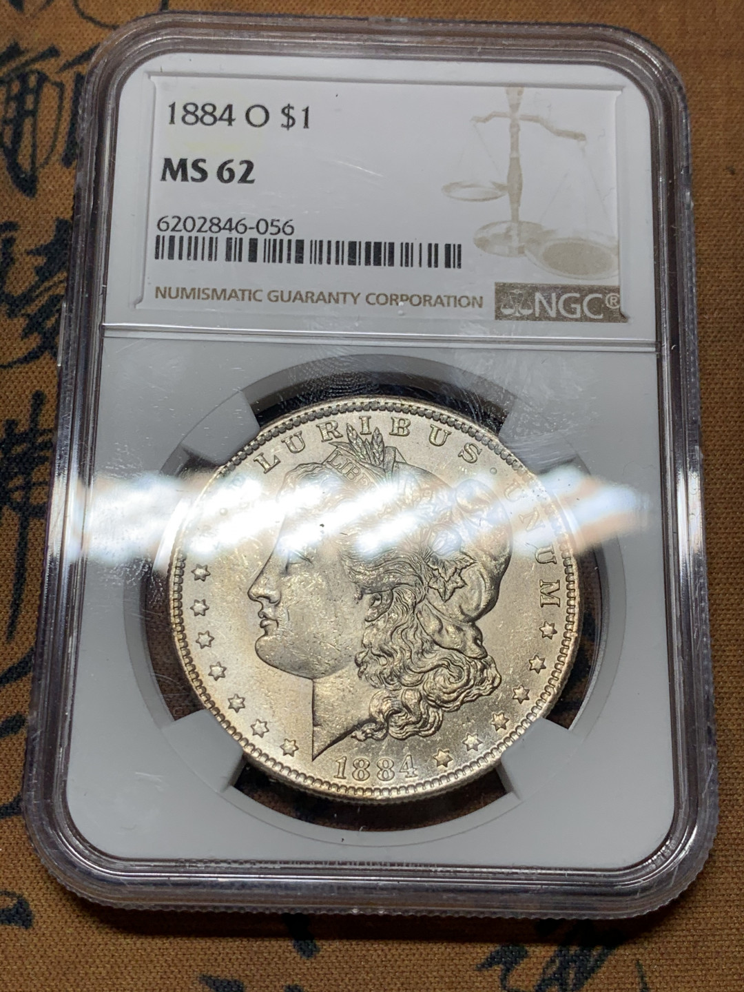 《竞宝斋》第31场（年内尾拍）-周日，周一，周二3场连拍（全场顺丰包邮） NGC-MS62 美国 1884年 1元 摩根银币