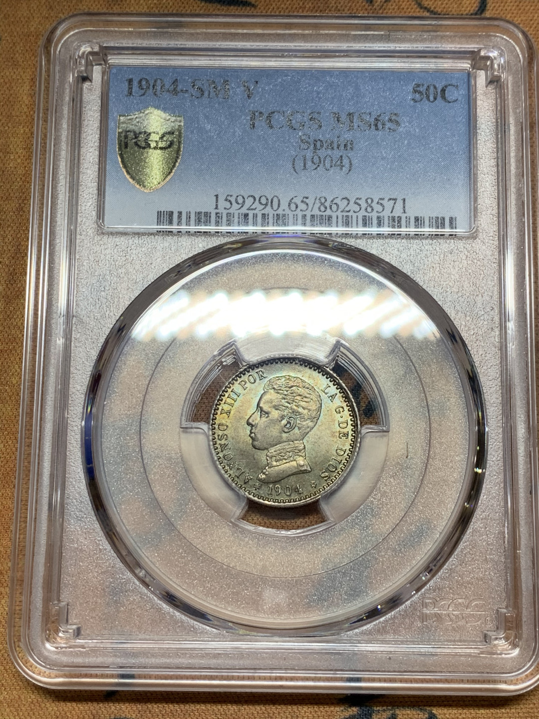 《竞宝斋》第31场（年内尾拍）-周日，周一，周二3场连拍（全场顺丰包邮） PCGS MS65 高分五彩 西班牙1904年 阿方索十三世 50C 银币  出场状态外加包浆 十分漂亮