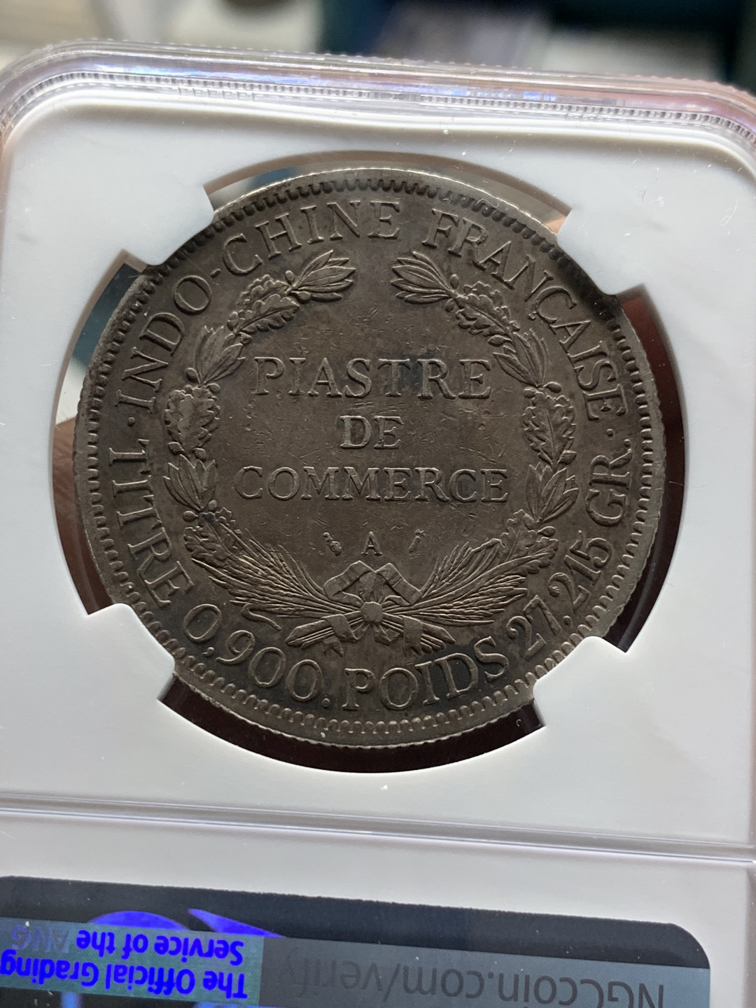 《竞宝斋》第31场（年内尾拍）-周日，周一，周二3场连拍（全场顺丰包邮） NGC 评级 深黑发财包浆 法属印支 1894年加重坐人 银币 鼻尖磨损 整体保存的很好