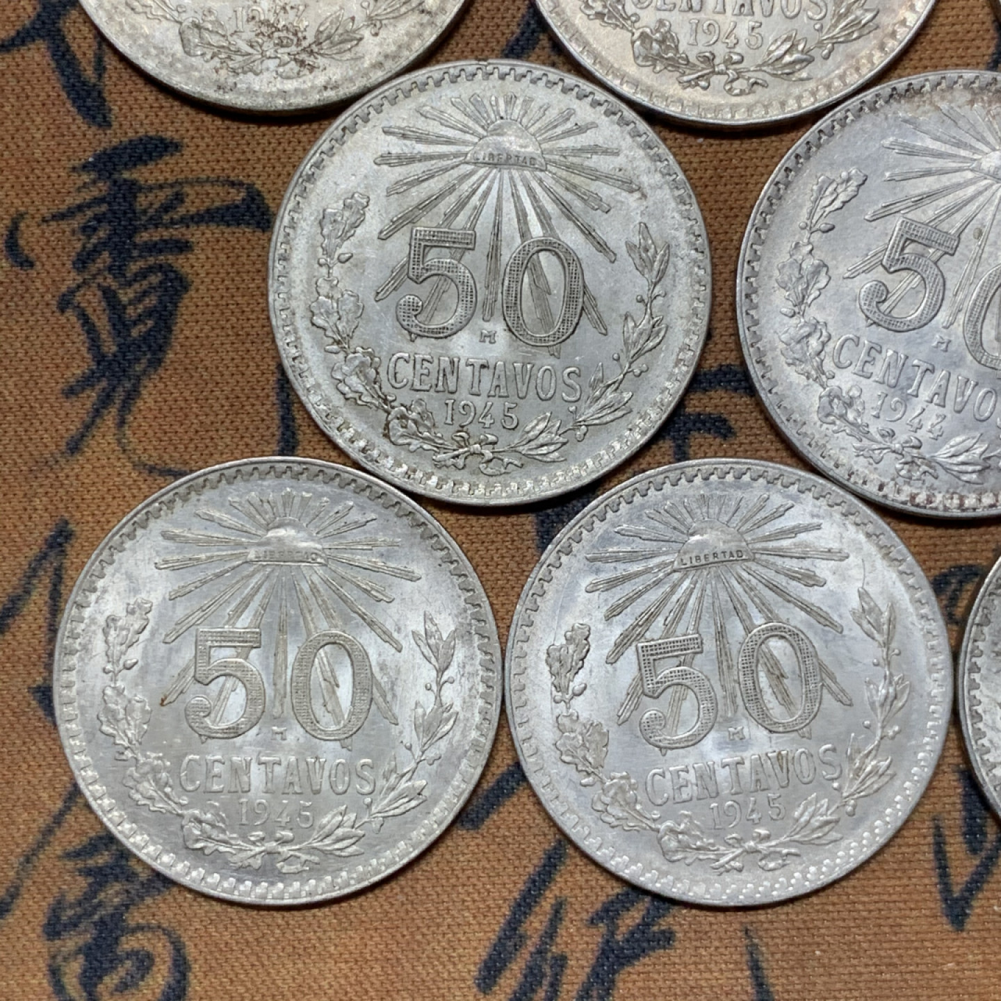 《竞宝斋》第31场（年内尾拍）-周日，周一，周二3场连拍（全场顺丰包邮） 8枚一组 二战期间1943-1945 墨西哥50分小鹰洋银币一组原光品相