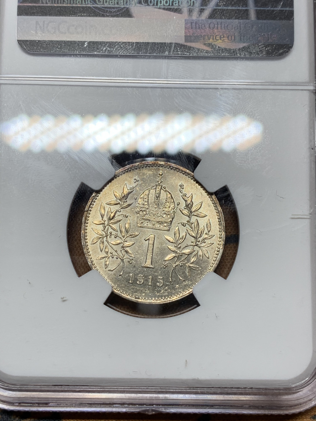 《竞宝斋》第31场（年内尾拍）-周日，周一，周二3场连拍（全场顺丰包邮） NGC-MS62 奥地利 1915年 1克朗银币