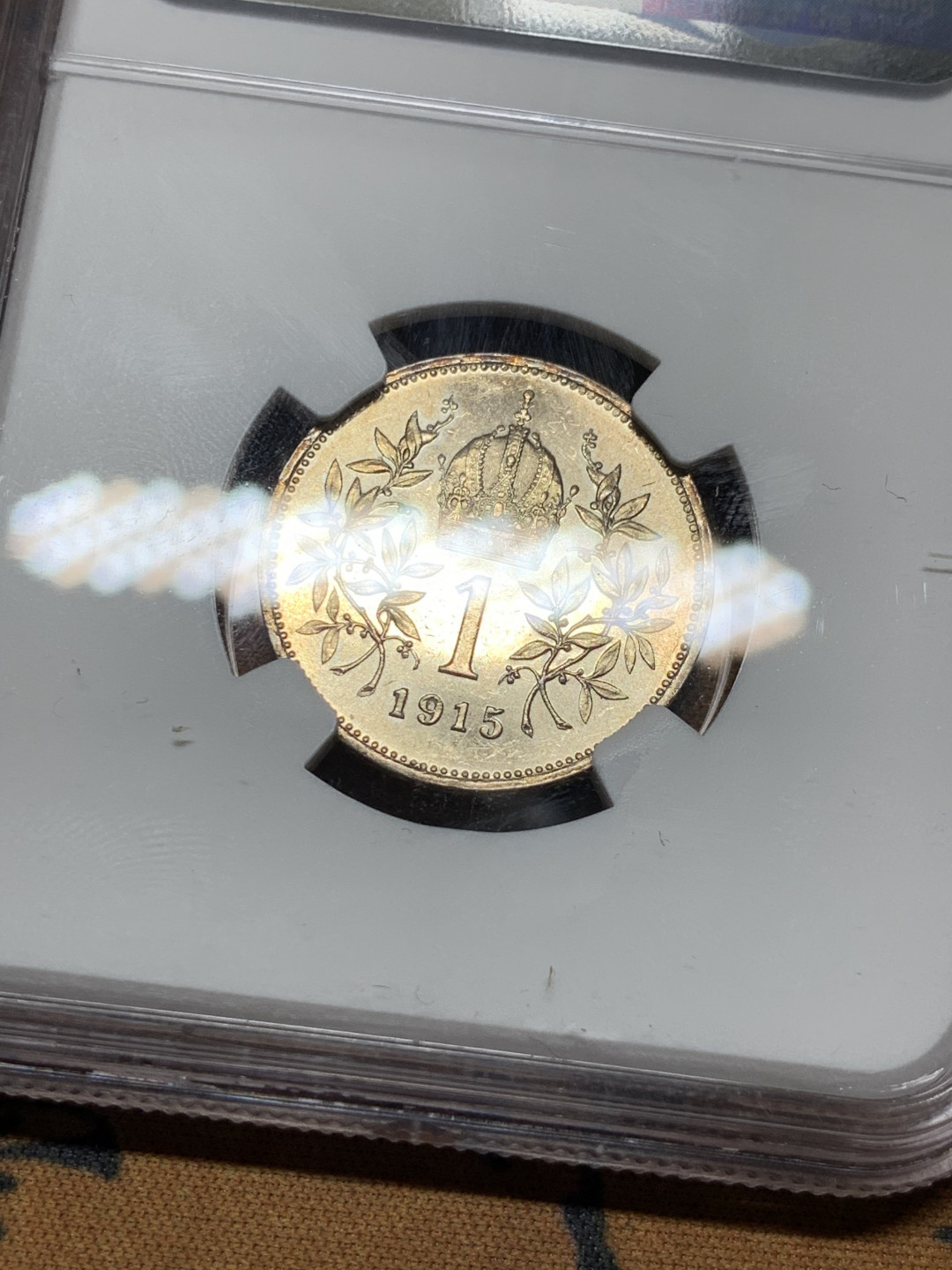 《竞宝斋》第31场（年内尾拍）-周日，周一，周二3场连拍（全场顺丰包邮） NGC-MS62 奥地利 1915年 1克朗银币