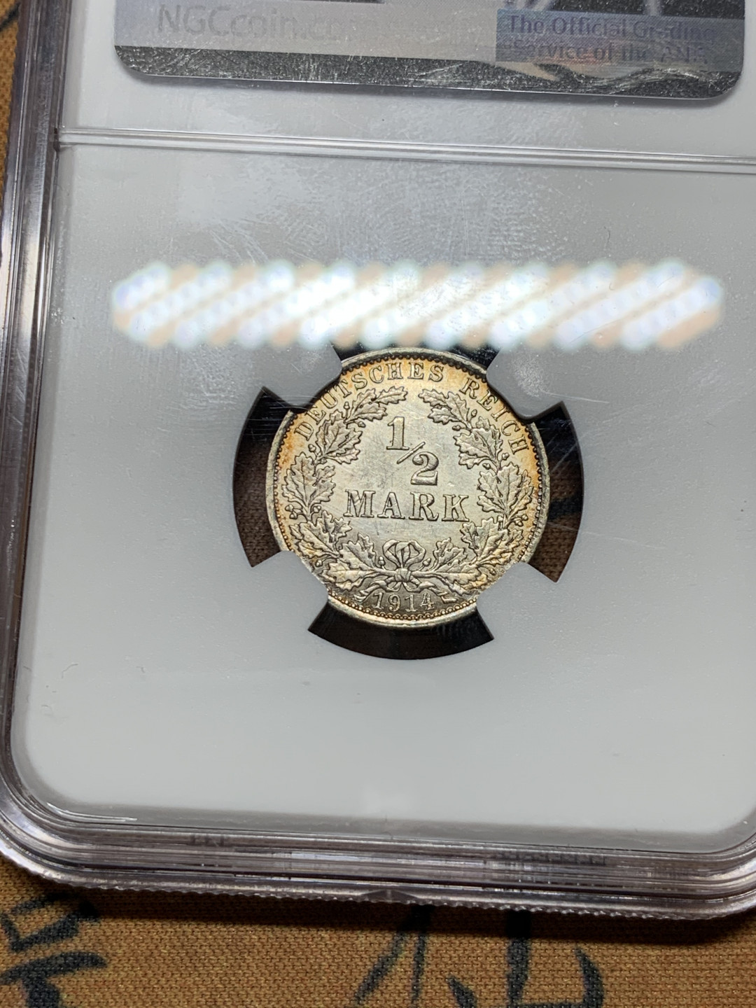 《竞宝斋》第31场（年内尾拍）-周日，周一，周二3场连拍（全场顺丰包邮） NGC-AU58 德国 1914年 1/2马克 银币  五彩重彩包浆