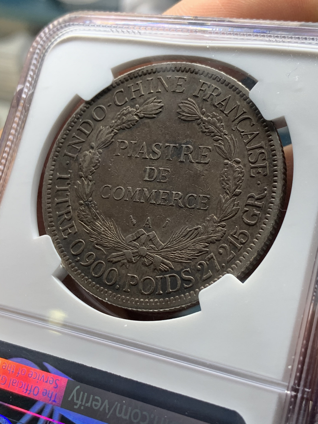 《竞宝斋》第31场（年内尾拍）-周日，周一，周二3场连拍（全场顺丰包邮） NGC 评级 深黑发财包浆 法属印支 1894年加重坐人 银币 鼻尖磨损 整体保存的很好