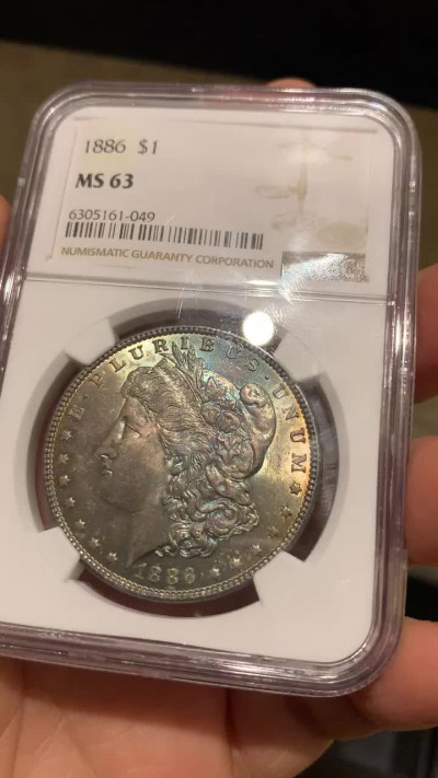 《竞宝斋》第31场（年内尾拍）-周日，周一，周二3场连拍（全场顺丰包邮） NGC-MS63 美国 1886年 1元 摩根银币 双面紫罗兰彩包浆美品