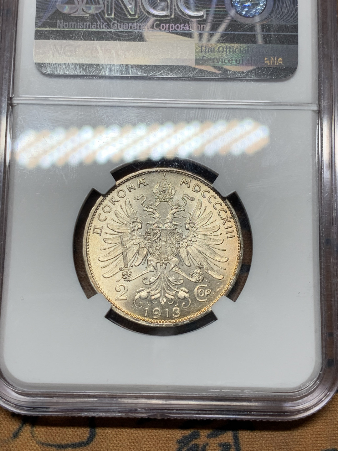 《竞宝斋》第31场（年内尾拍）-周日，周一，周二3场连拍（全场顺丰包邮） NGC-MS63 奥地利 1913年 2克朗银币 金黄包浆