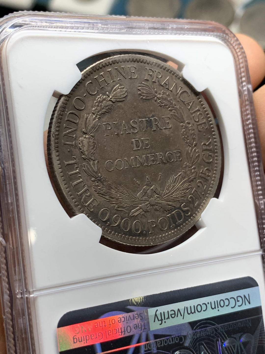 《竞宝斋》第31场（年内尾拍）-周日，周一，周二3场连拍（全场顺丰包邮） NGC 评级 深黑发财包浆 法属印支 1894年加重坐人 银币 鼻尖磨损 整体保存的很好