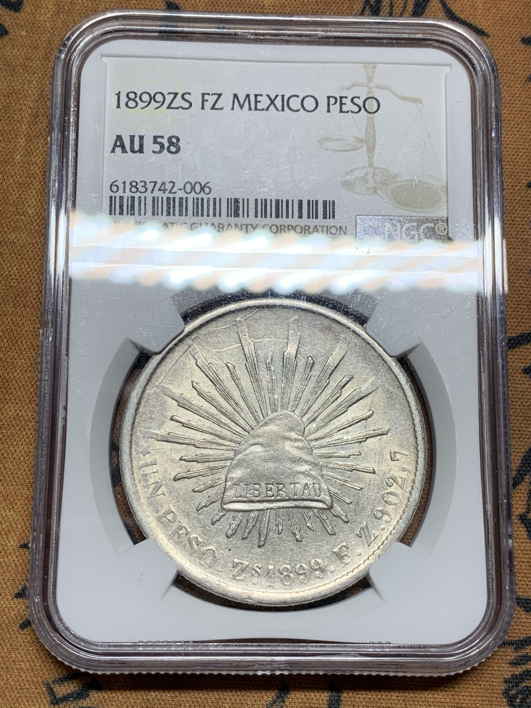 《竞宝斋》第31场（年内尾拍）-周日，周一，周二3场连拍（全场顺丰包邮） NGC AU58 1899墨西哥萨卡特卡斯厂 直边鹰洋（少见厂别）全羽原光 品相相当漂亮