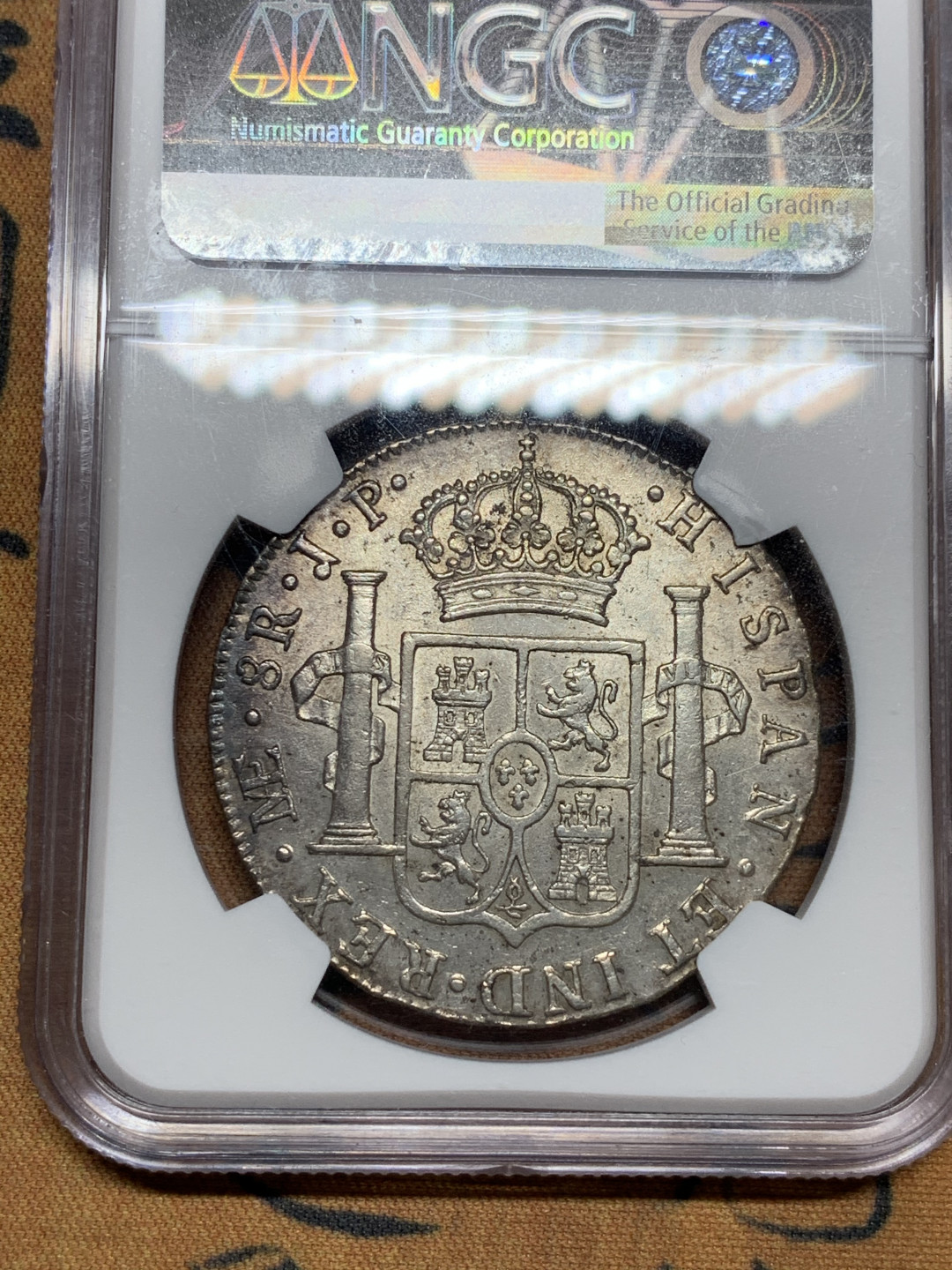 《竞宝斋》第31场（年内尾拍）-周日，周一，周二3场连拍（全场顺丰包邮） NGC AU55 秘鲁利马LIMA 1814年 费七 8R 双柱大银币 正反深打 背面MS品的底板 喜欢不要错过
