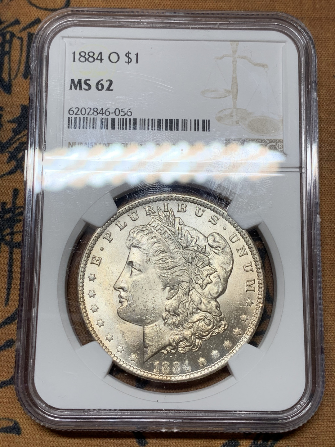 《竞宝斋》第31场（年内尾拍）-周日，周一，周二3场连拍（全场顺丰包邮） NGC-MS62 美国 1884年 1元 摩根银币