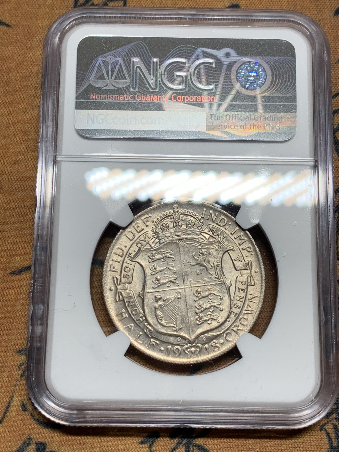 《竞宝斋》第31场（年内尾拍）-周日，周一，周二3场连拍（全场顺丰包邮） NGC-AU58 英国 1918年 高银版 乔五半克朗银币 因为模具所致 乔五半克朗基本见不到头发，这枚细节很好