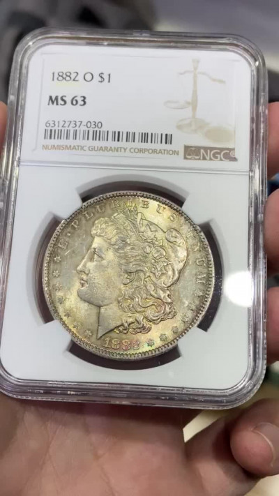 【Numismatist】第四场-0起拍-0佣金-包邮-世界硬币 美国1882年摩根银币O版 NGC评级MS63分 双面均匀彩 很漂亮