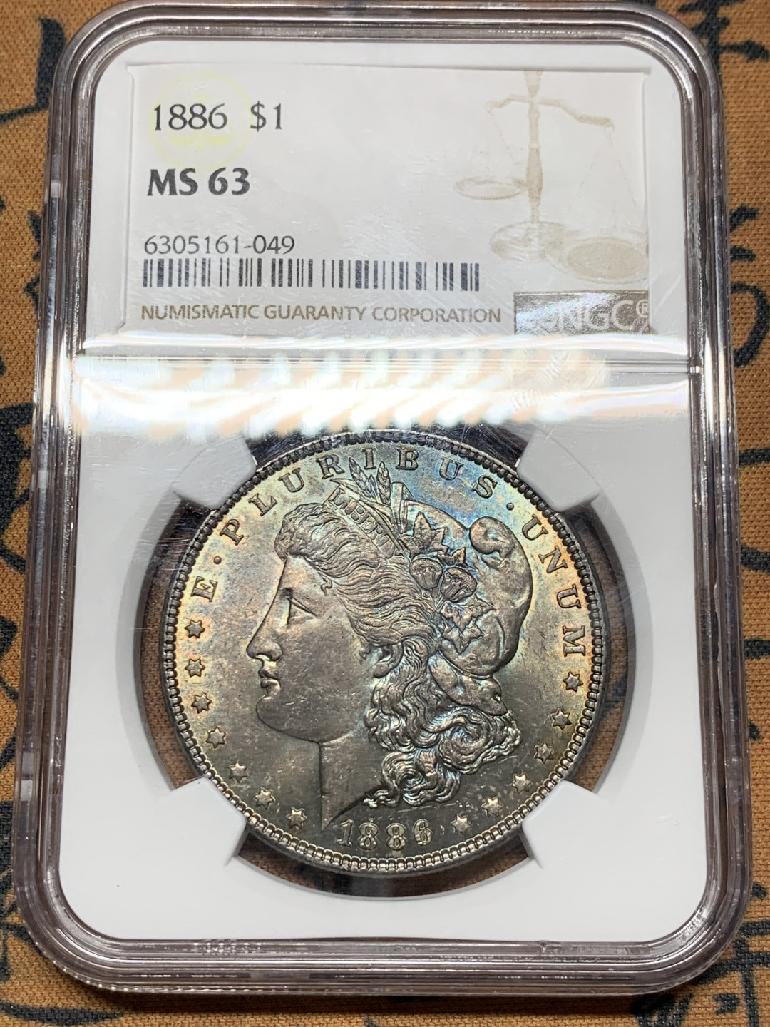 《竞宝斋》第31场（年内尾拍）-周日，周一，周二3场连拍（全场顺丰包邮） NGC-MS63 美国 1886年 1元 摩根银币 双面紫罗兰彩包浆美品