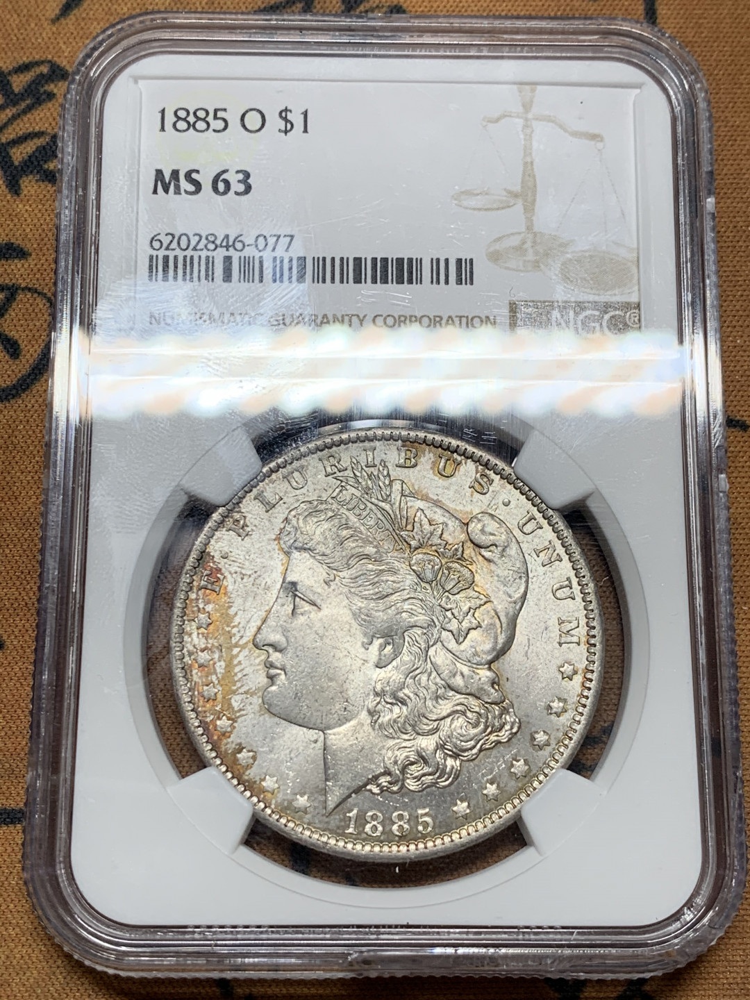 《竞宝斋》第31场（年内尾拍）-周日，周一，周二3场连拍（全场顺丰包邮） NGC-MS63 美国 1885年 1元 摩根银币 淡金包浆美品 盒子下边缘快递有损