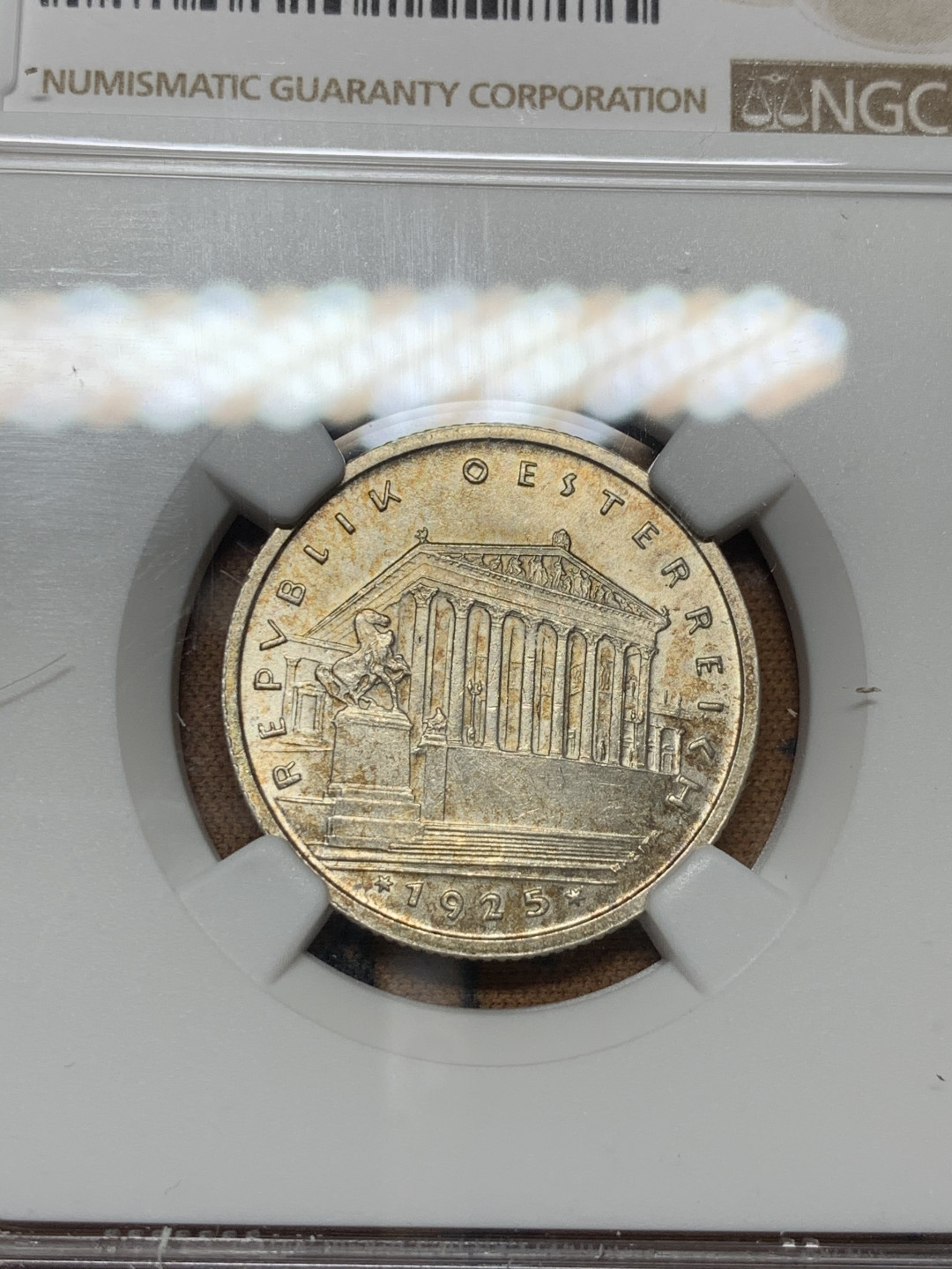 《竞宝斋》第31场（年内尾拍）-周日，周一，周二3场连拍（全场顺丰包邮） NGC-MS63 奥地利 1925年 1先令 小版银币 淡金包浆