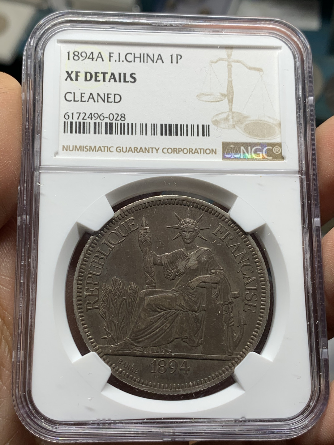 《竞宝斋》第31场（年内尾拍）-周日，周一，周二3场连拍（全场顺丰包邮） NGC 评级 深黑发财包浆 法属印支 1894年加重坐人 银币 鼻尖磨损 整体保存的很好