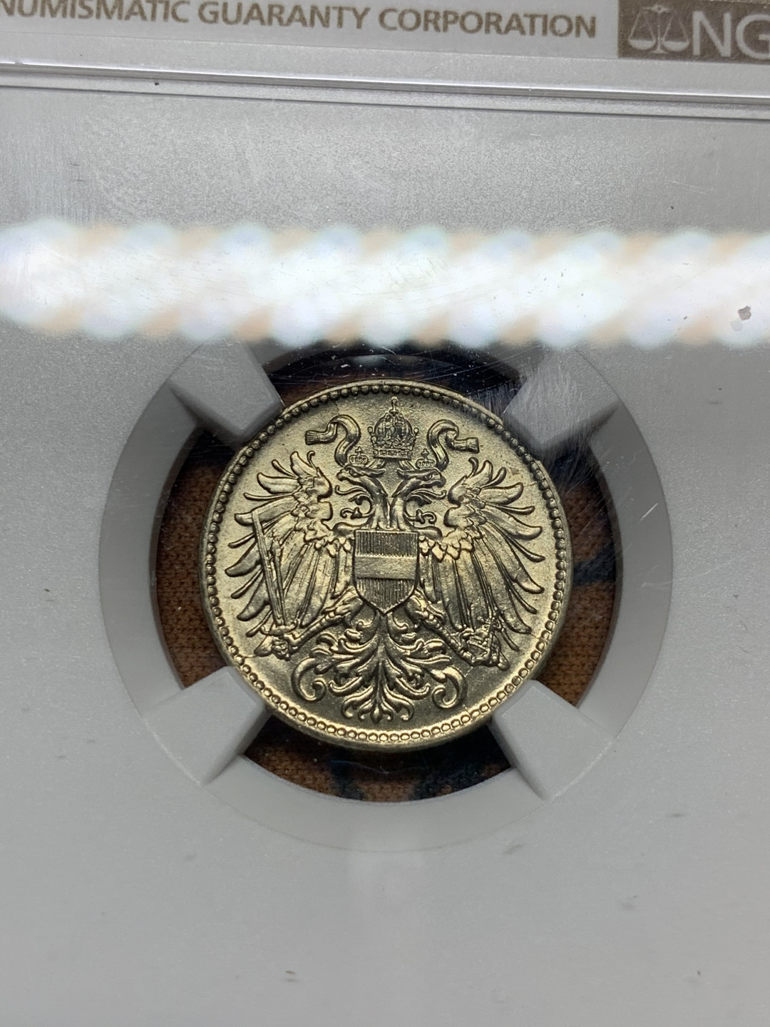 《竞宝斋》第31场（年内尾拍）-周日，周一，周二3场连拍（全场顺丰包邮） NGC-MS65 奥地利 1916年 10赫勒镍币