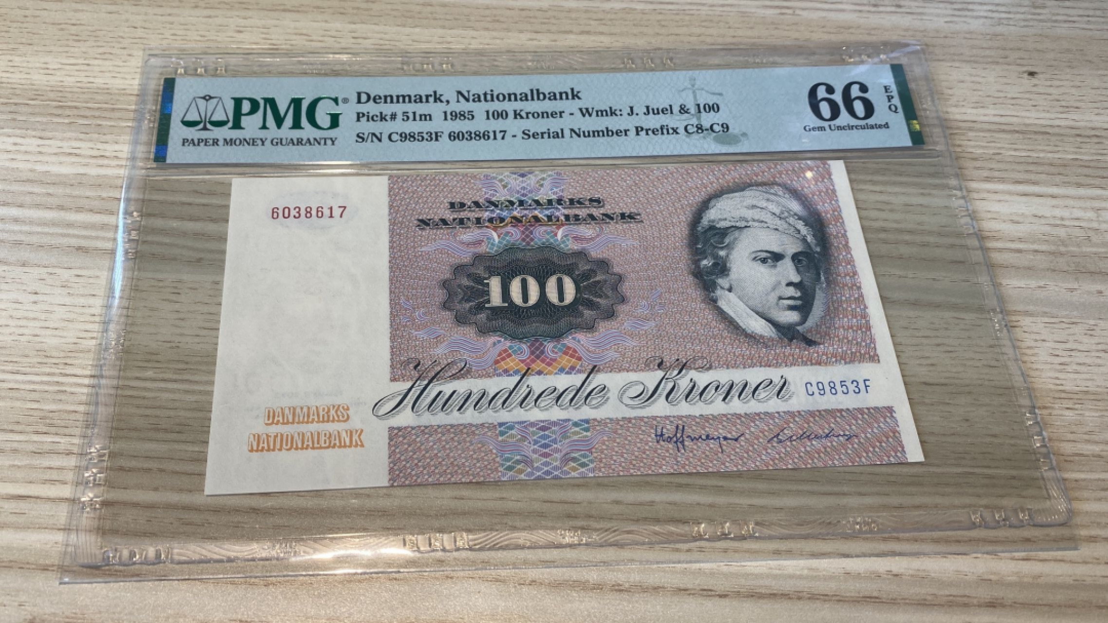 Chase Auction 第1期 - -世界纸币精萃 1985年丹麦100克朗，PMG66分，画家延斯尤尔！精美大蛾子！