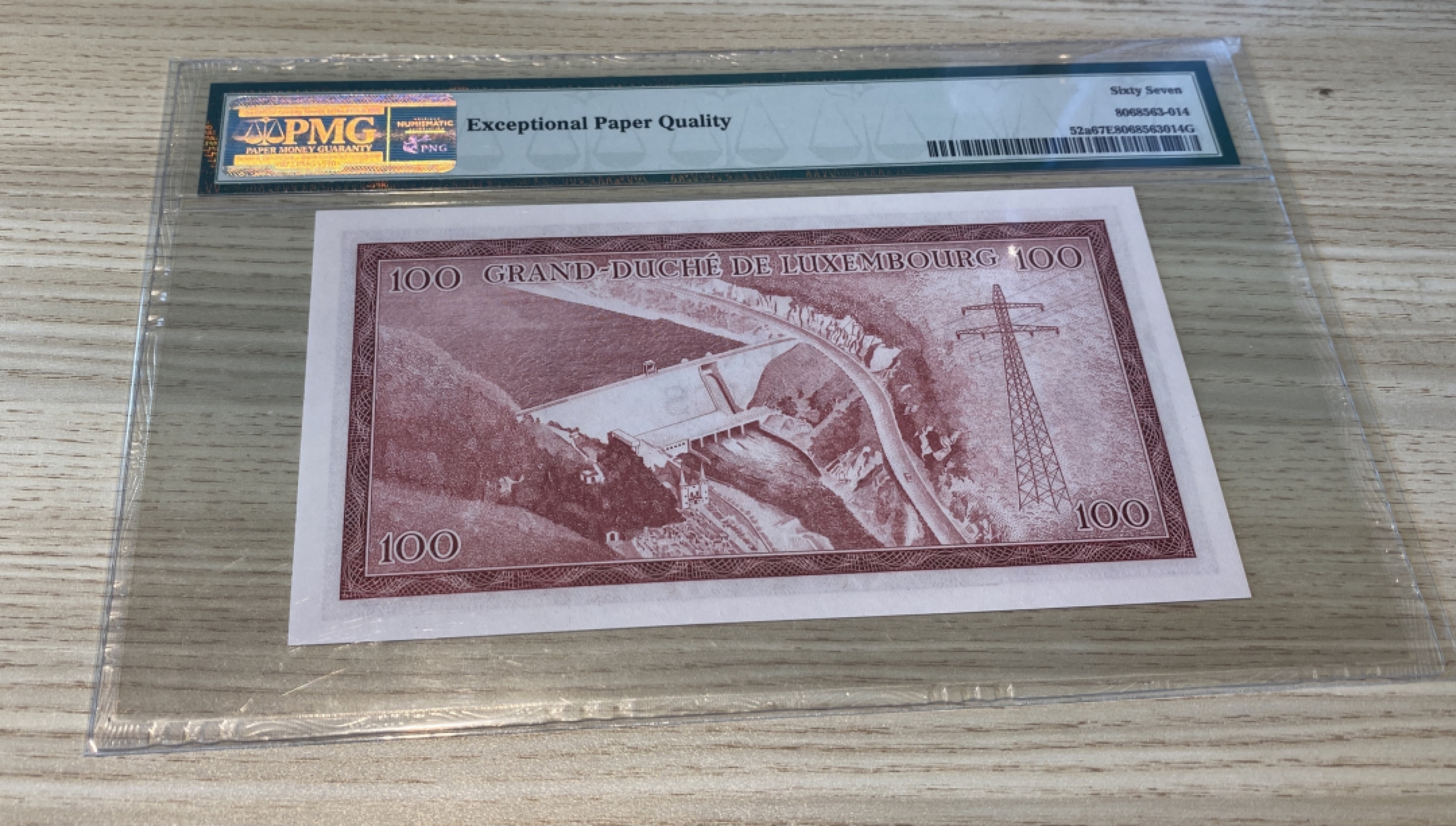 Chase Auction 第1期 - -世界纸币精萃 1963年卢森堡100法郎，PMG67分，女大公夏洛特头像！其统治卢森堡45年！