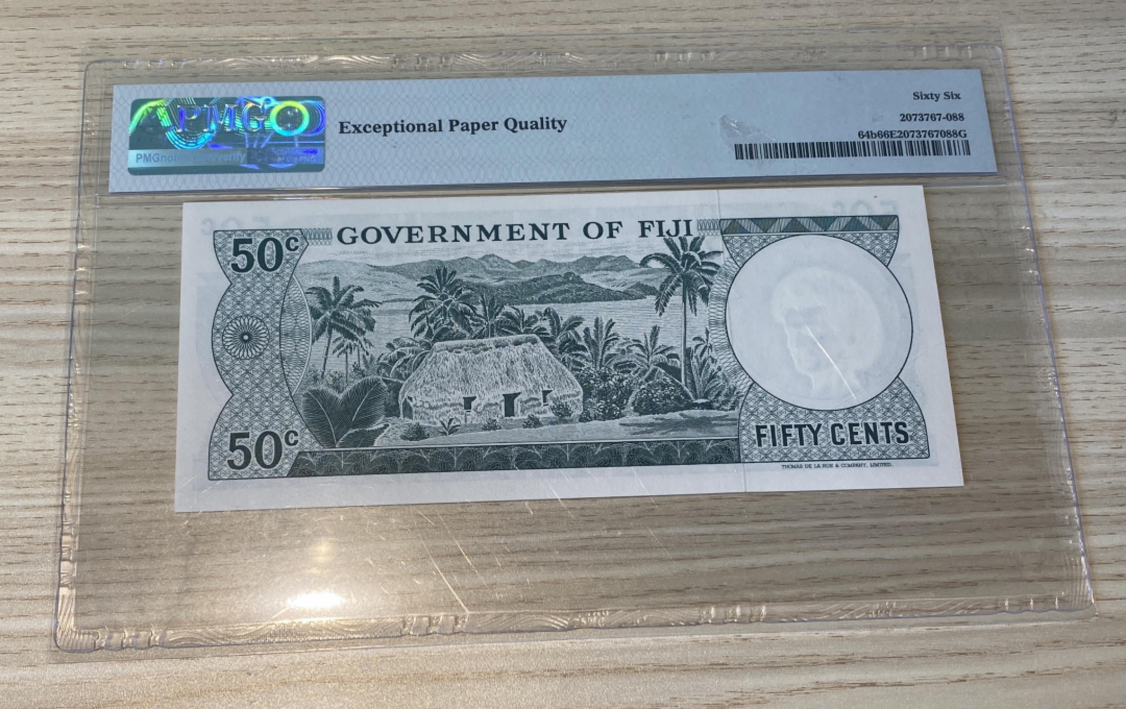 Chase Auction 第1期 - -世界纸币精萃 1971年斐济50分，PMG66分，戎装女王头像！