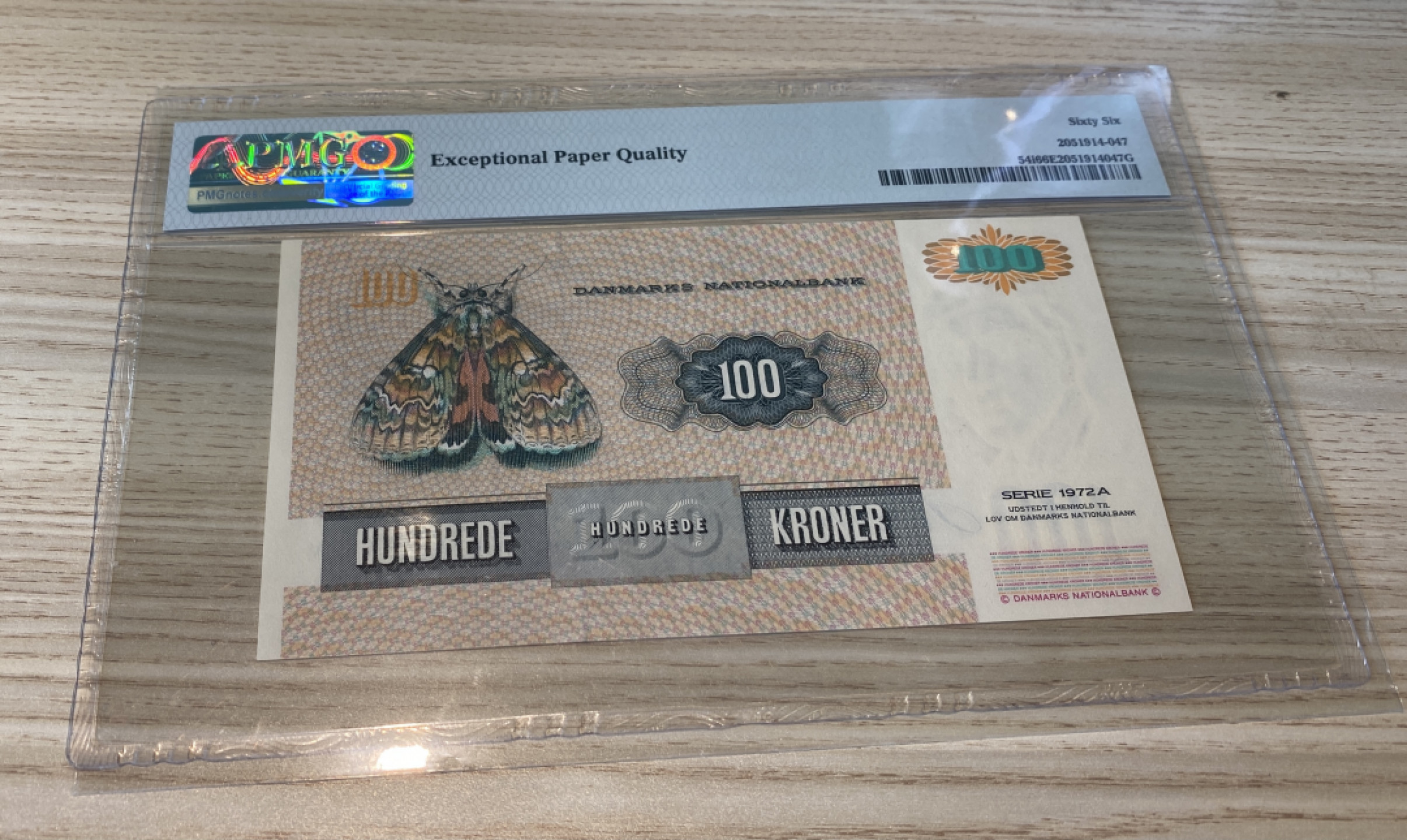 Chase Auction 第1期 - -世界纸币精萃 1998年丹麦100克朗，PMG66分，画家延斯尤尔！精美大蛾子！