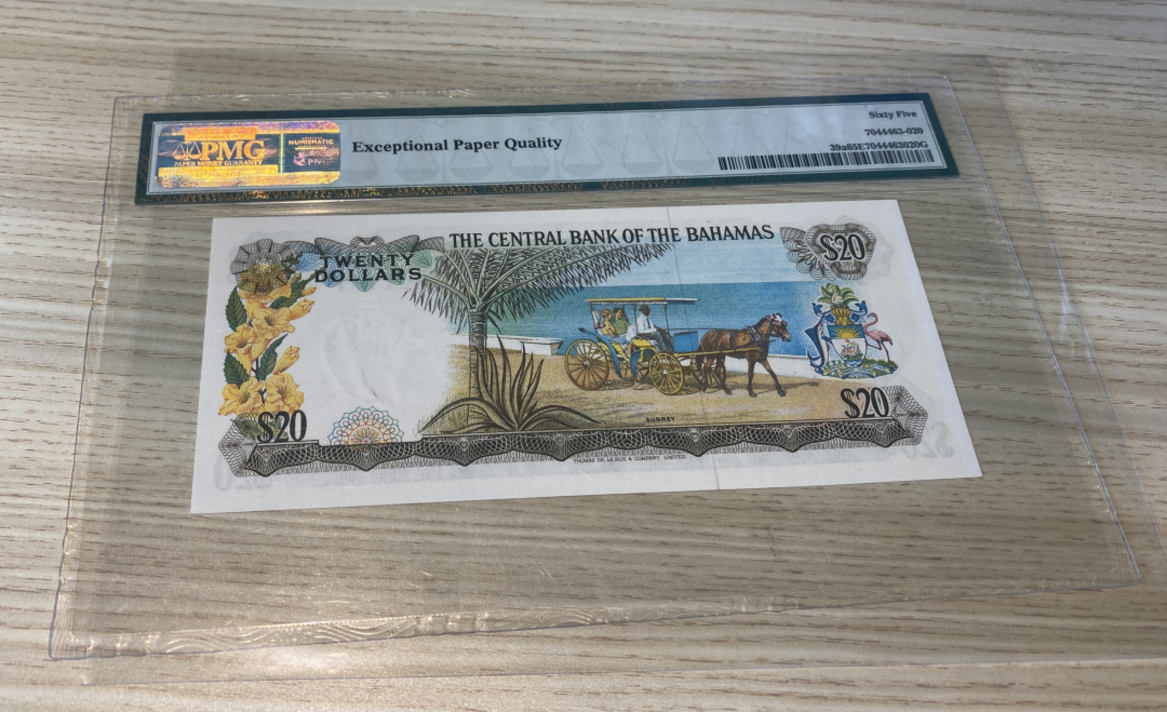 Chase Auction 第1期 - -世界纸币精萃 1974年巴哈马20刀，PMG65，青年女王！经典彩背！