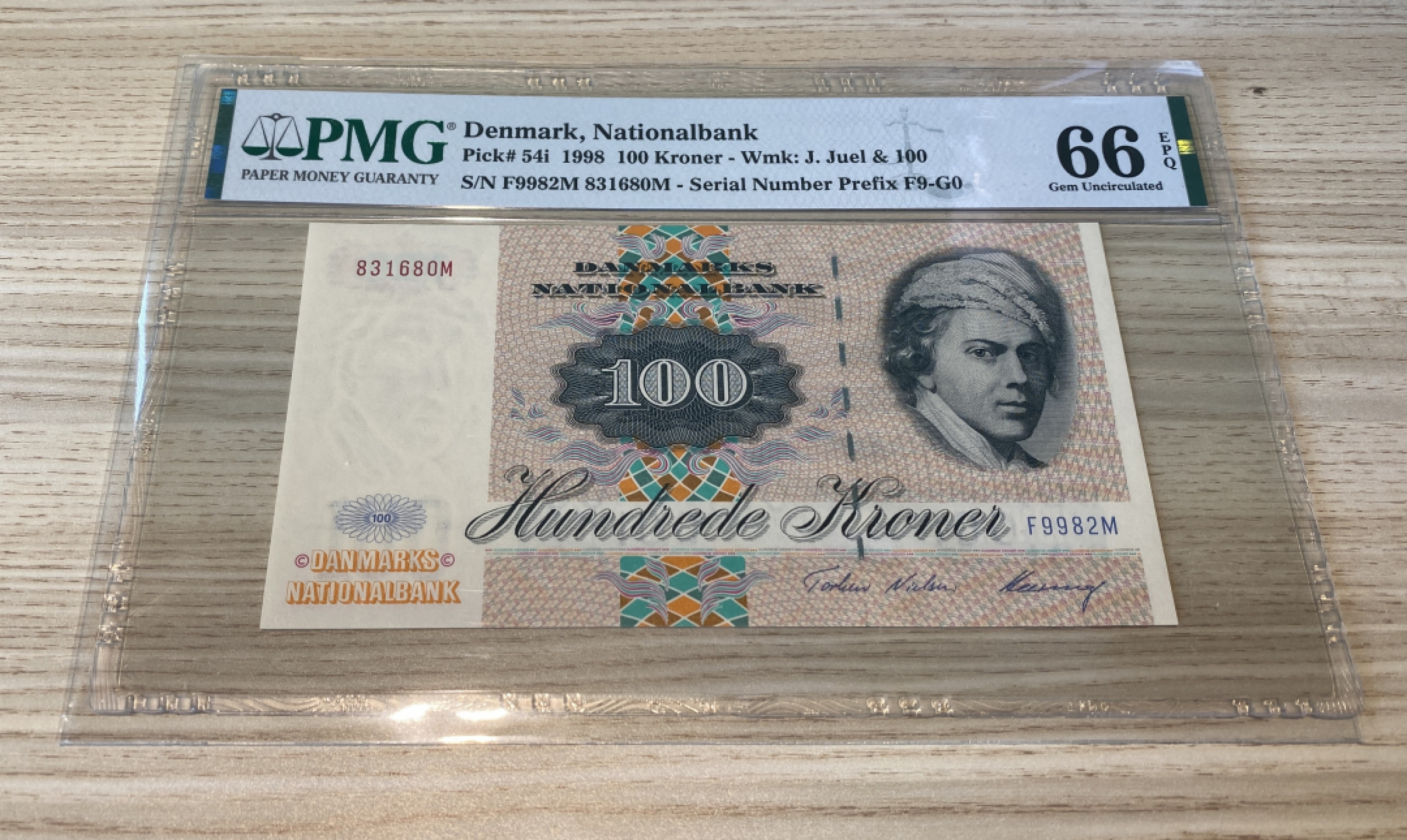 Chase Auction 第1期 - -世界纸币精萃 1998年丹麦100克朗，PMG66分，画家延斯尤尔！精美大蛾子！
