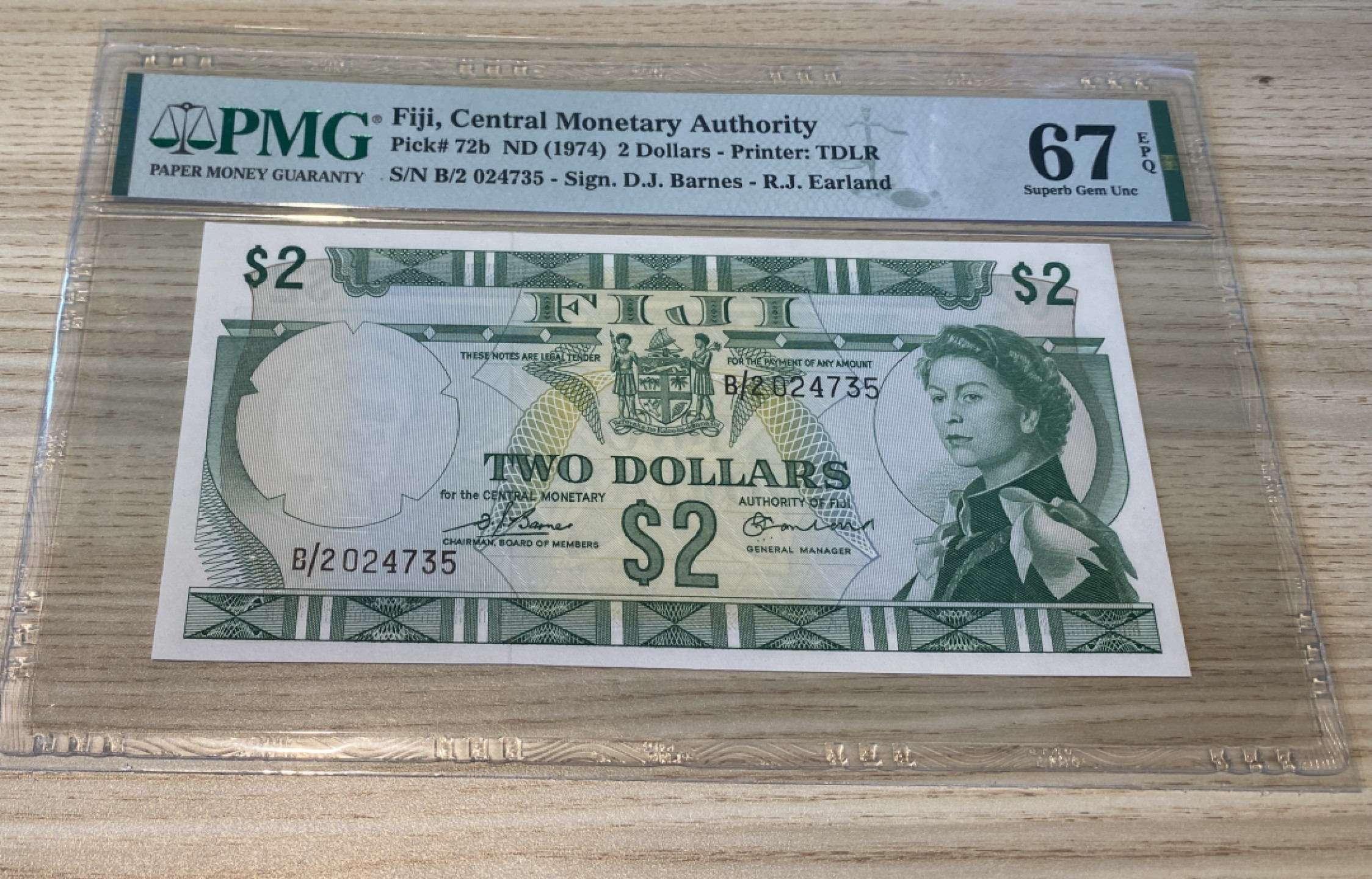 Chase Auction 第1期 - -世界纸币精萃 1974年斐济2元，PMG67分，戎装女王！