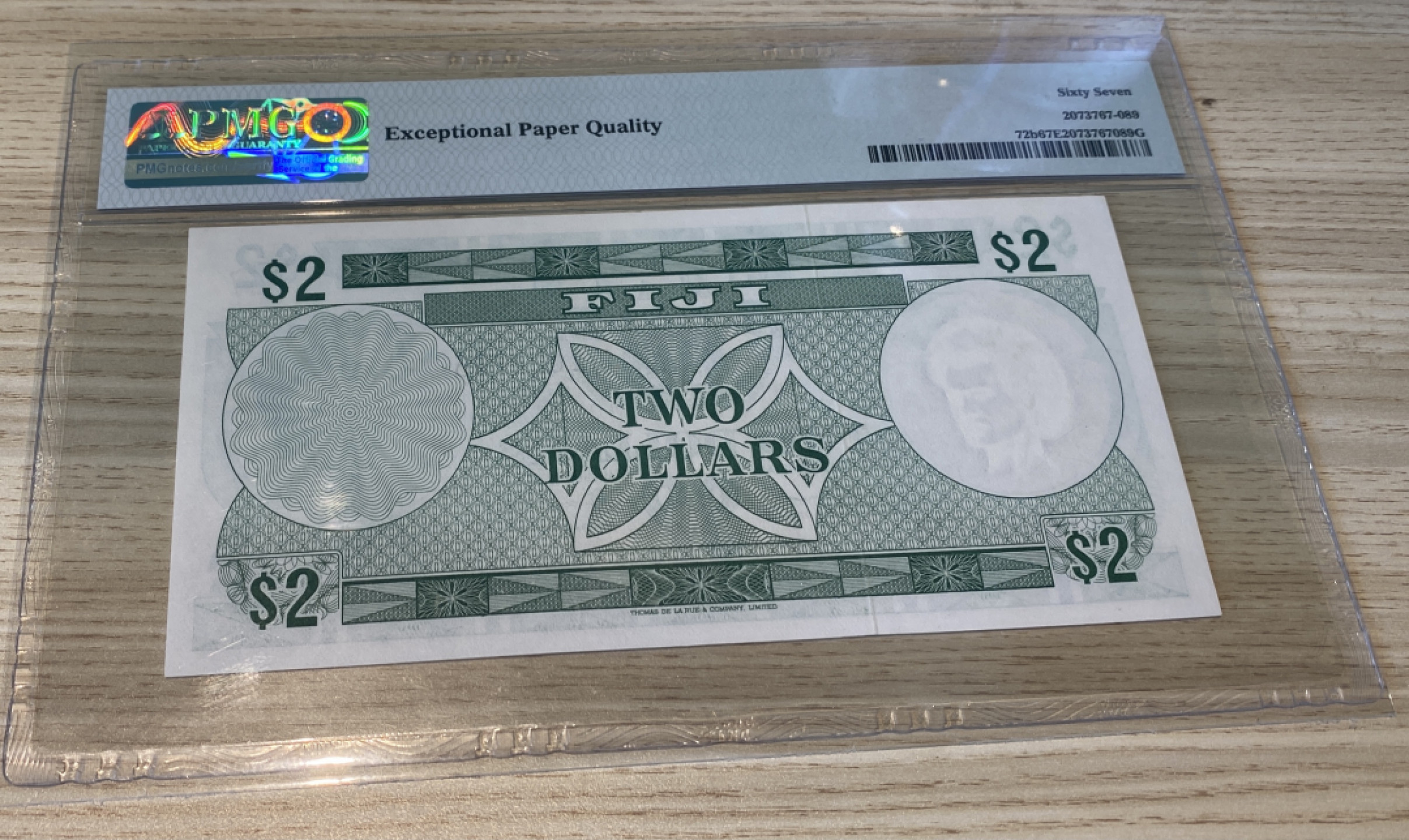 Chase Auction 第1期 - -世界纸币精萃 1974年斐济2元，PMG67分，戎装女王！