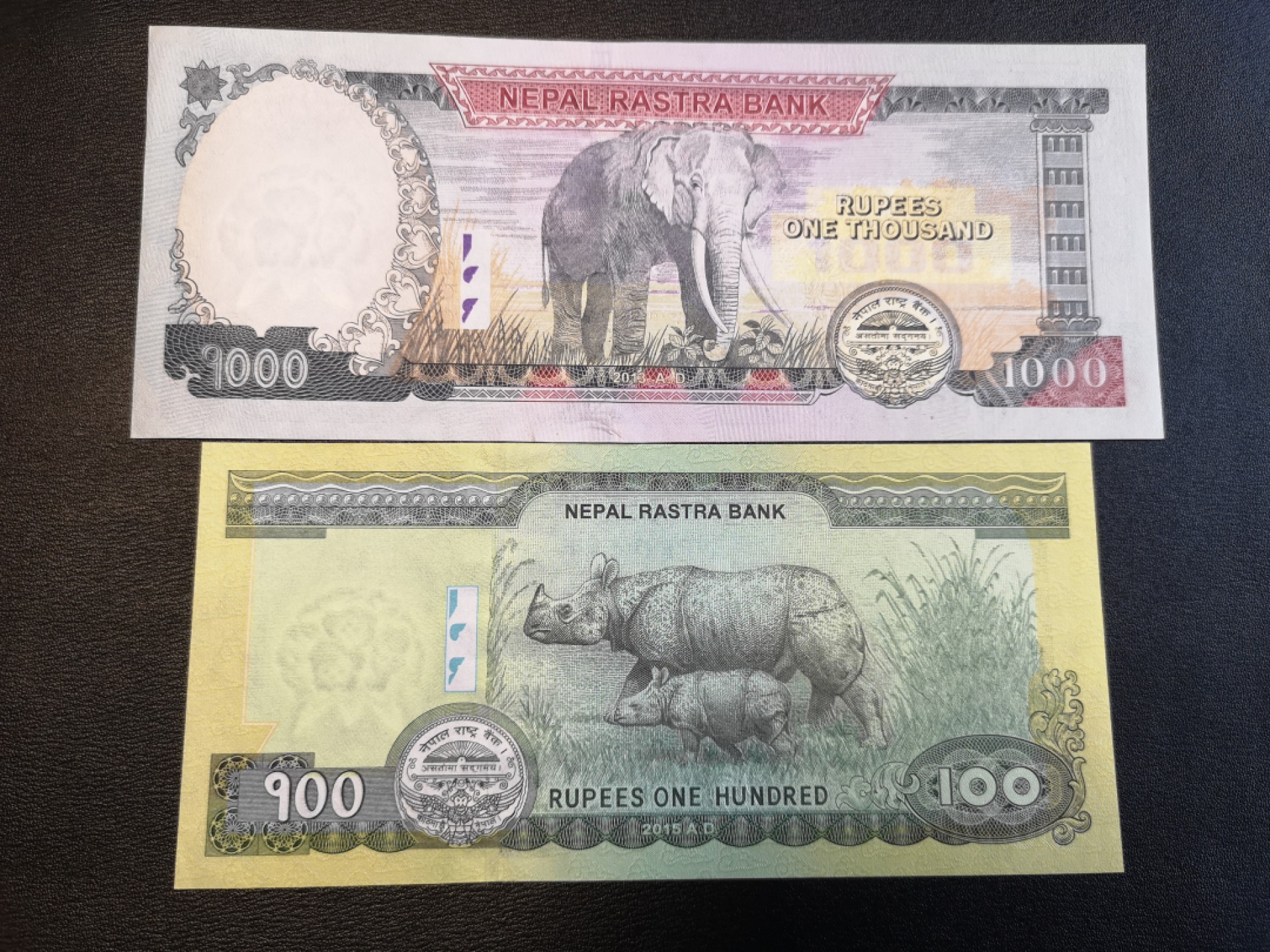 《外钞收藏家》第一百六十五期拍卖（本期80件） 尼泊尔100、1000两张一起 全新UNC