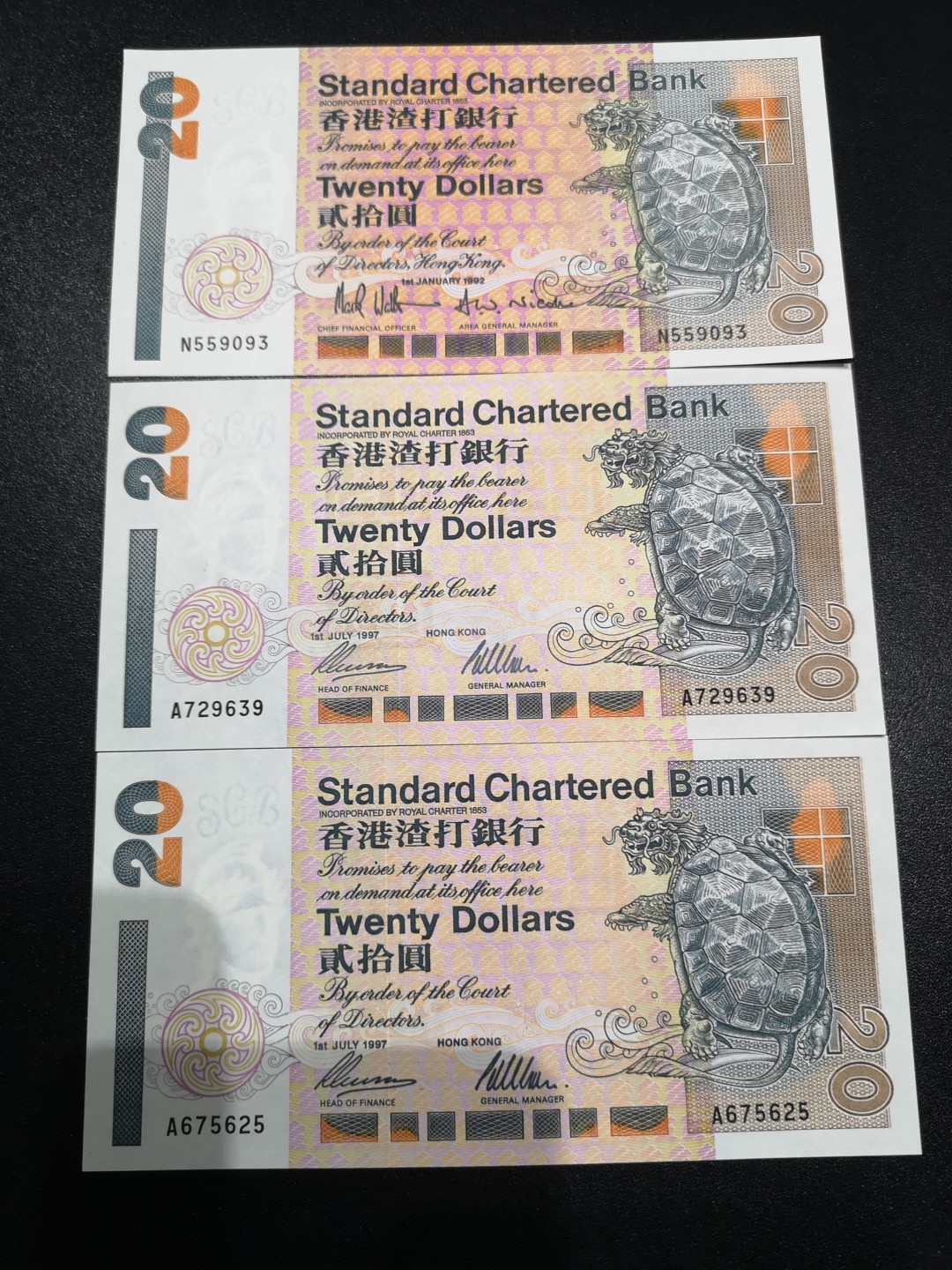 《外钞收藏家》第一百六十四期拍卖（本期100件） 香港渣打银行20元 三张 全新UNC 两张A冠 92年是少见年份