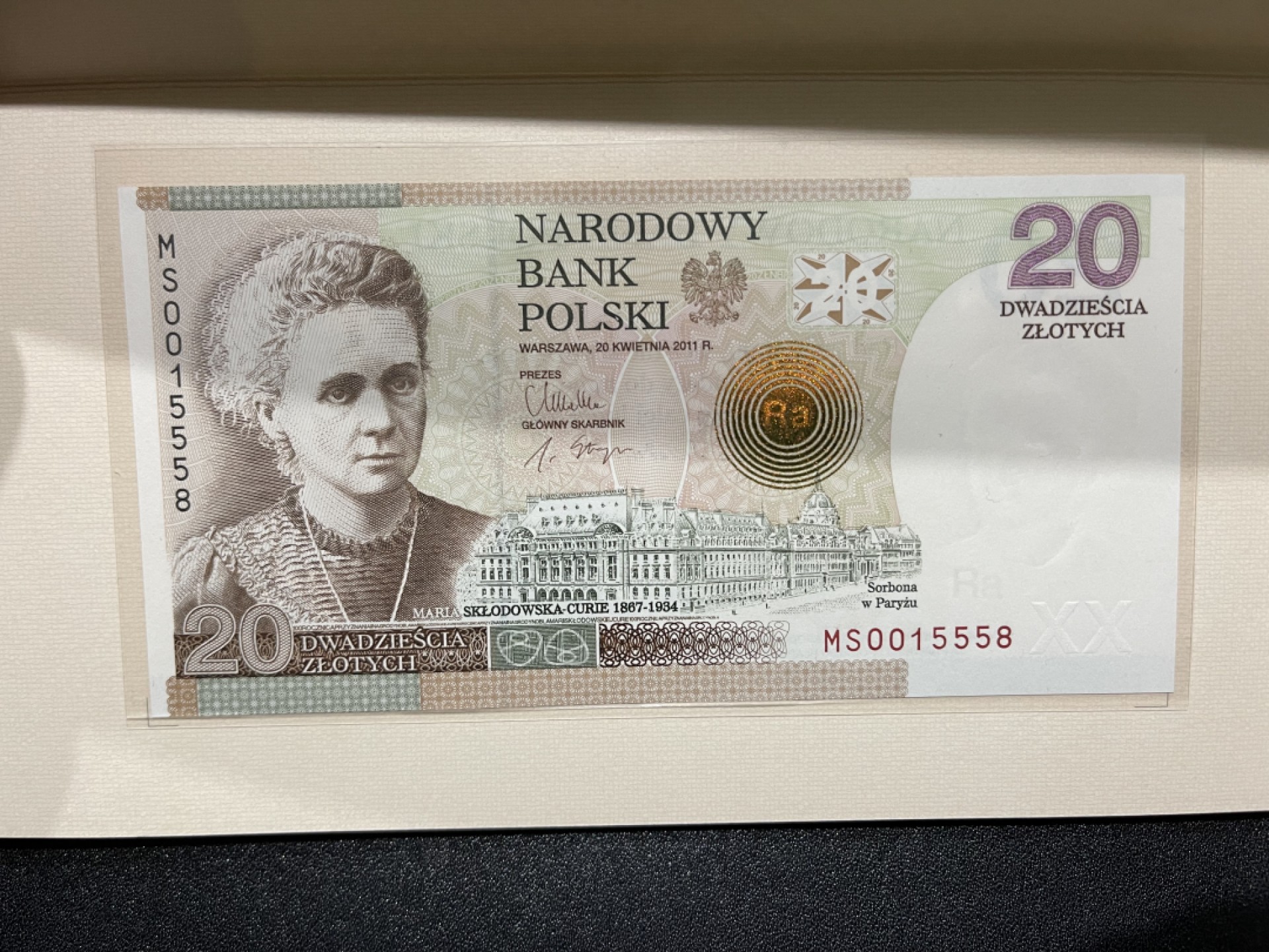 《外钞收藏家》第一百六十四期拍卖（本期100件） 2011年波兰20兹罗提 居里夫人 无47靓号 全新UNC 原装册子