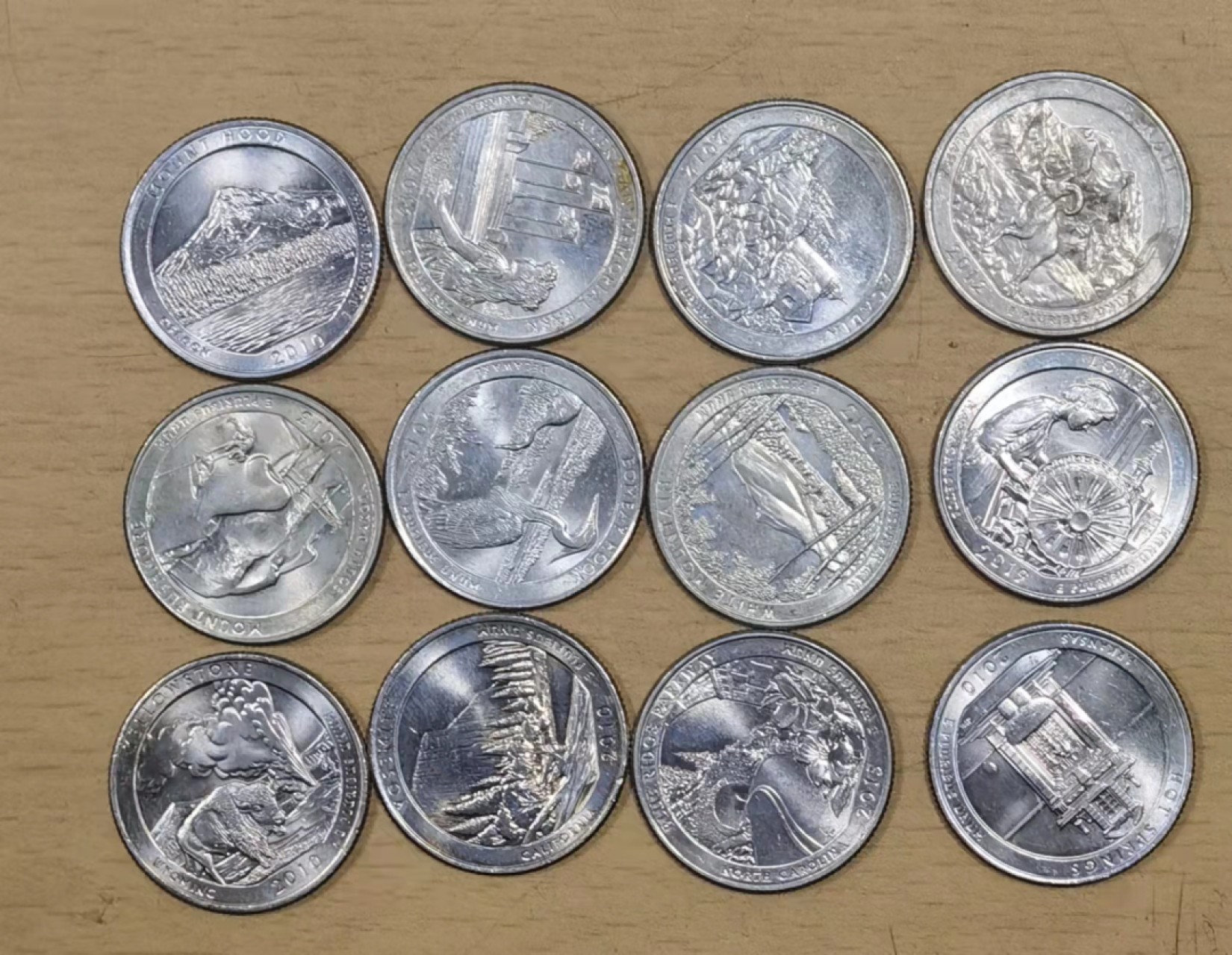 北京马甸外币专卖微拍第六十九期，外国非贵金属流通币，纪念币专场，陆续上新欢迎关注 美国公园纪念币12枚