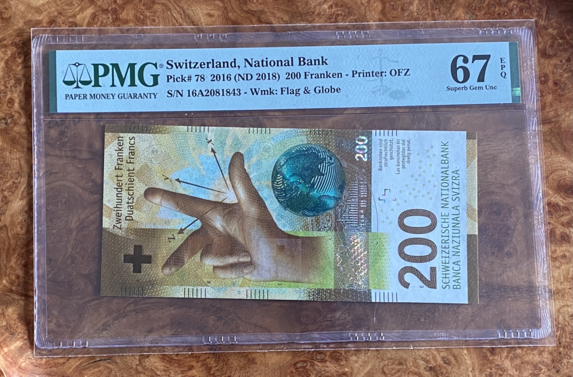 得物拍卖 Chase Auction  第2期 - -世界纸币精粹（二） 2016年瑞士200瑞郎，首发A冠，PMG67分，手版！象征物质与科技！