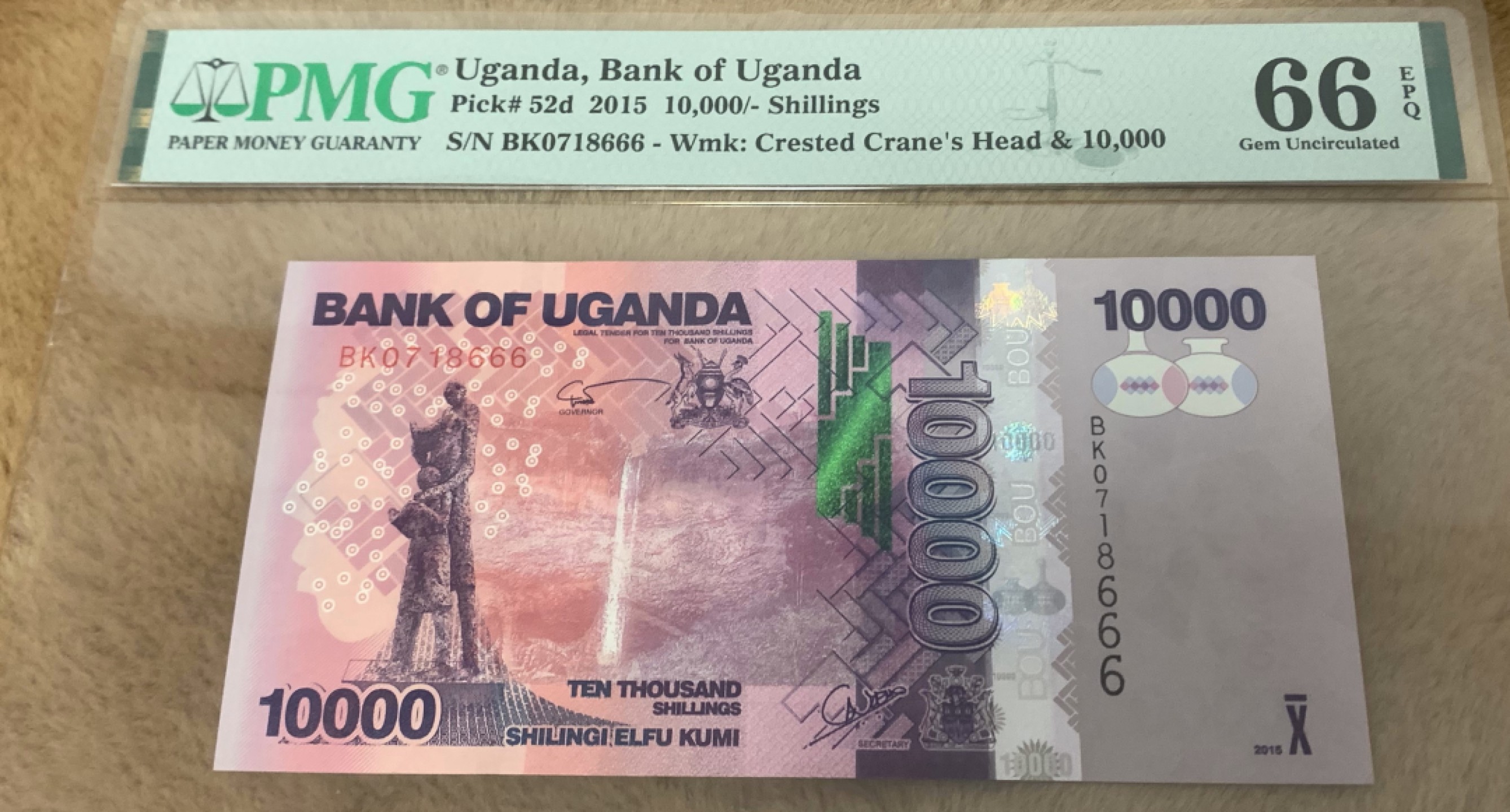 圣域骑士团 | 虎年新春上元节 专场 第二期（2022002期） 2015年 乌干达 10000先令 PMG66分 P52d  豹子号666