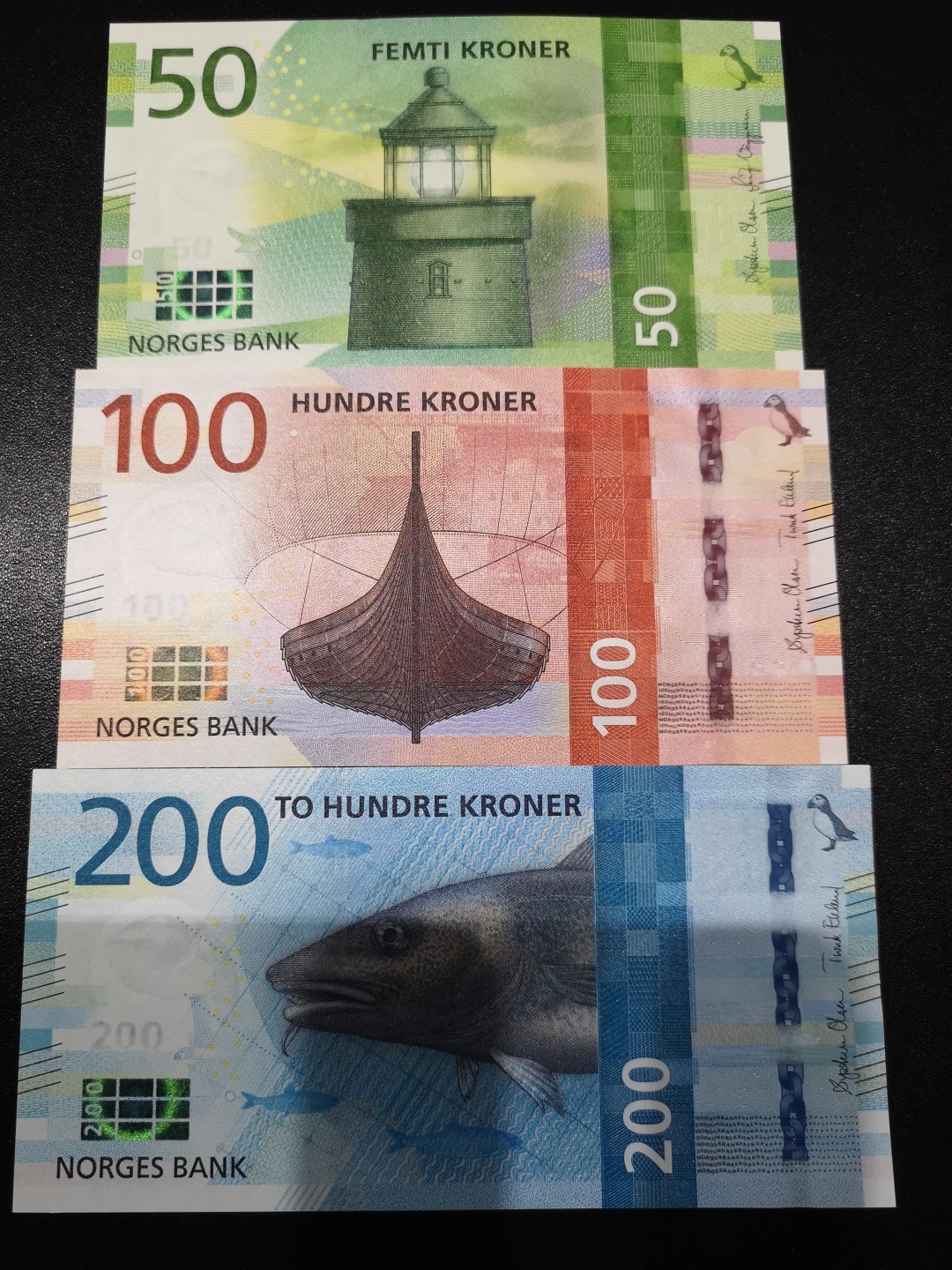 《外钞收藏家》第一百六十五期拍卖（本期80件） 最新版挪威50、100、200克朗三张小套 全新UNC