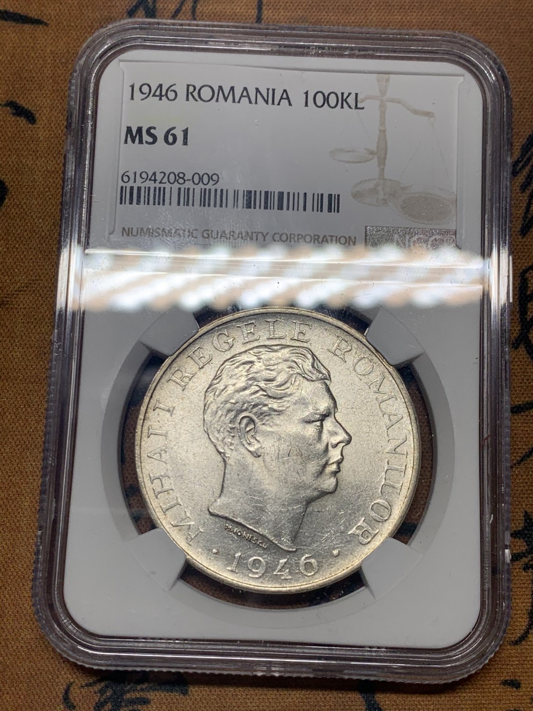 《竞宝斋》微拍-第32场-周日（全场顺丰包邮） NGC MS61 罗马尼亚王国 1946年 100000里拉 米哈伊一世大银币 罗马尼亚末代国王，大转光，仅发行一年，超大面值 