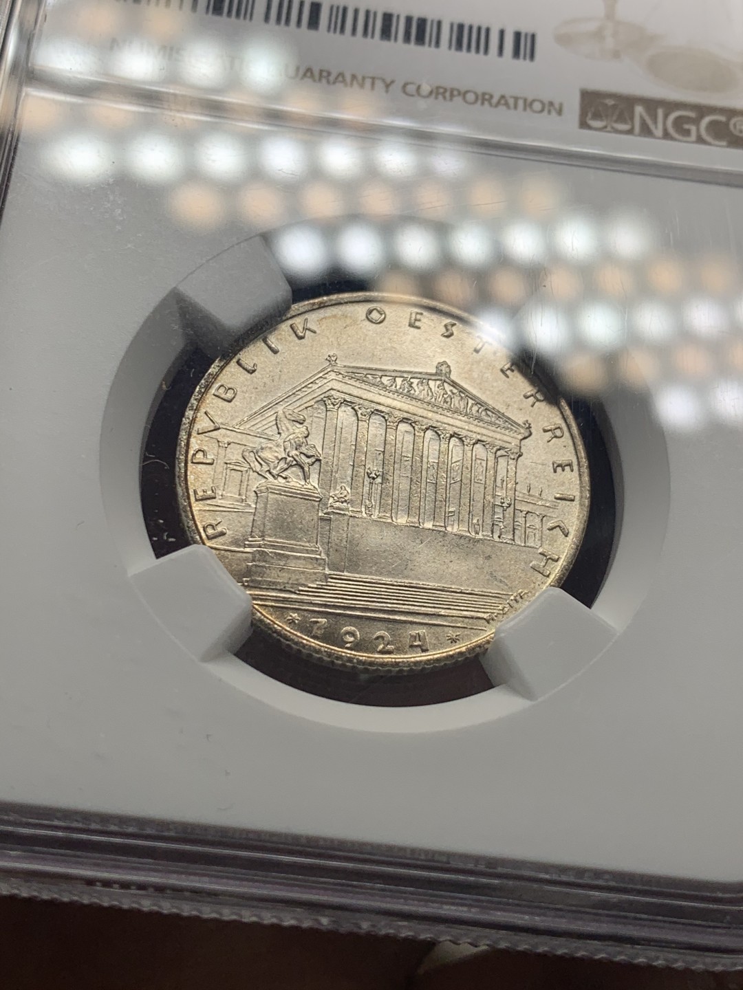 《竞宝斋》微拍-第32场-周日（全场顺丰包邮） NGC-MS64 奥地利 1924年 1先令 大版银币 淡金包浆