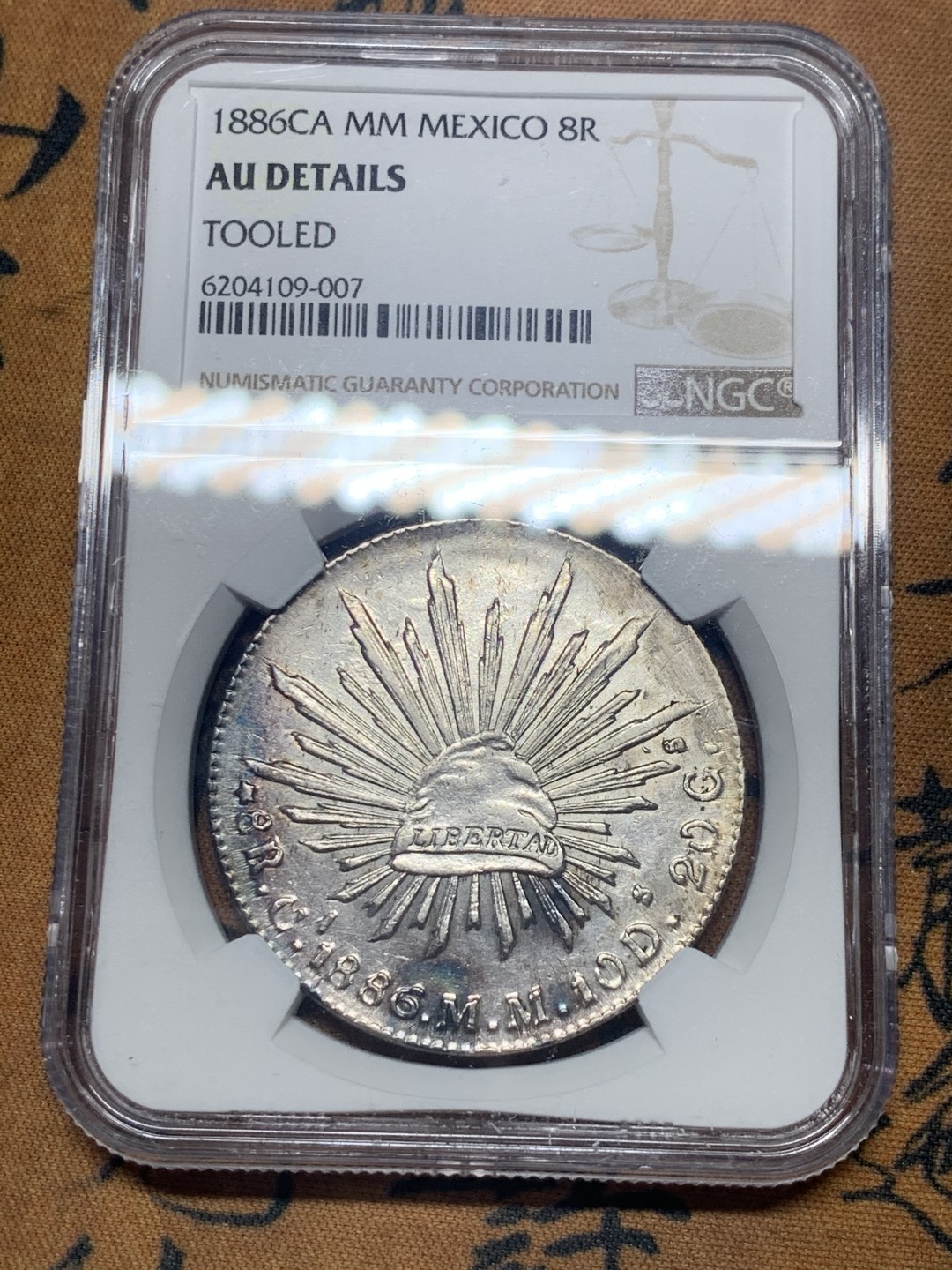 《竞宝斋》微拍-第32场-周日（全场顺丰包邮） NGC-AUD  1886 墨西哥鹰洋 8 里亚尔 深打底板 全羽状态