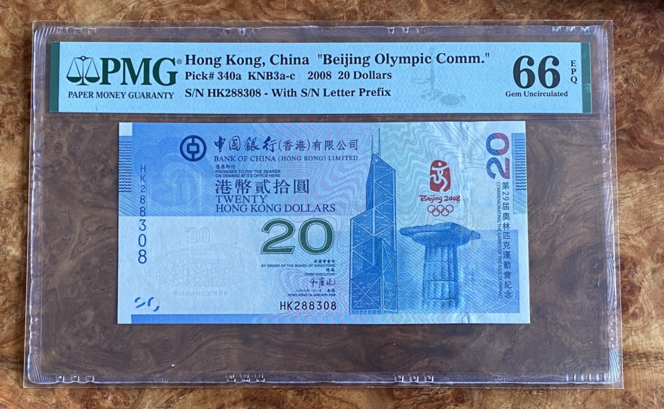 得物拍卖 Chase Auction  第2期 - -世界纸币精粹（二） 2008年香港奥运钞一张，PMG66分，无47尾8！正面为古代奥林匹克运动发源地的遗址建筑图案及香港中银大厦等，背面为鸟巢！