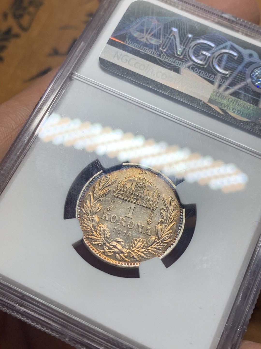 《竞宝斋》微拍-第32场-周日（全场顺丰包邮） NGC-UNCD 匈牙利 1914年 1克朗银币 双面金黄包浆