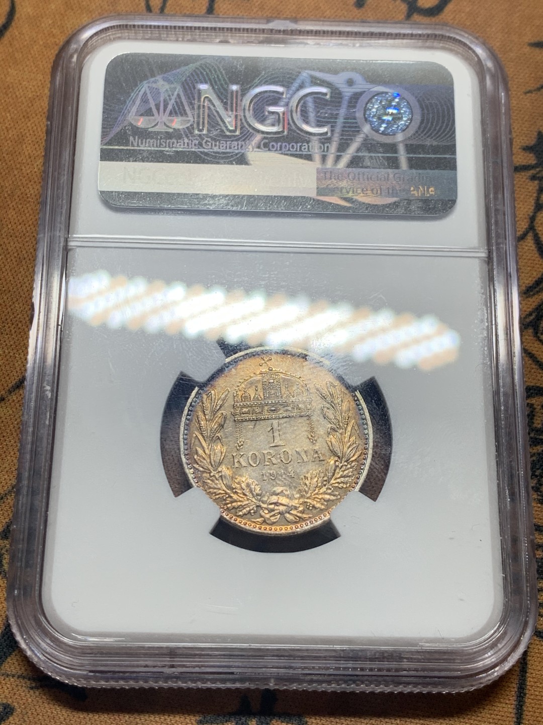 《竞宝斋》微拍-第32场-周日（全场顺丰包邮） NGC-UNCD 匈牙利 1914年 1克朗银币 双面金黄包浆