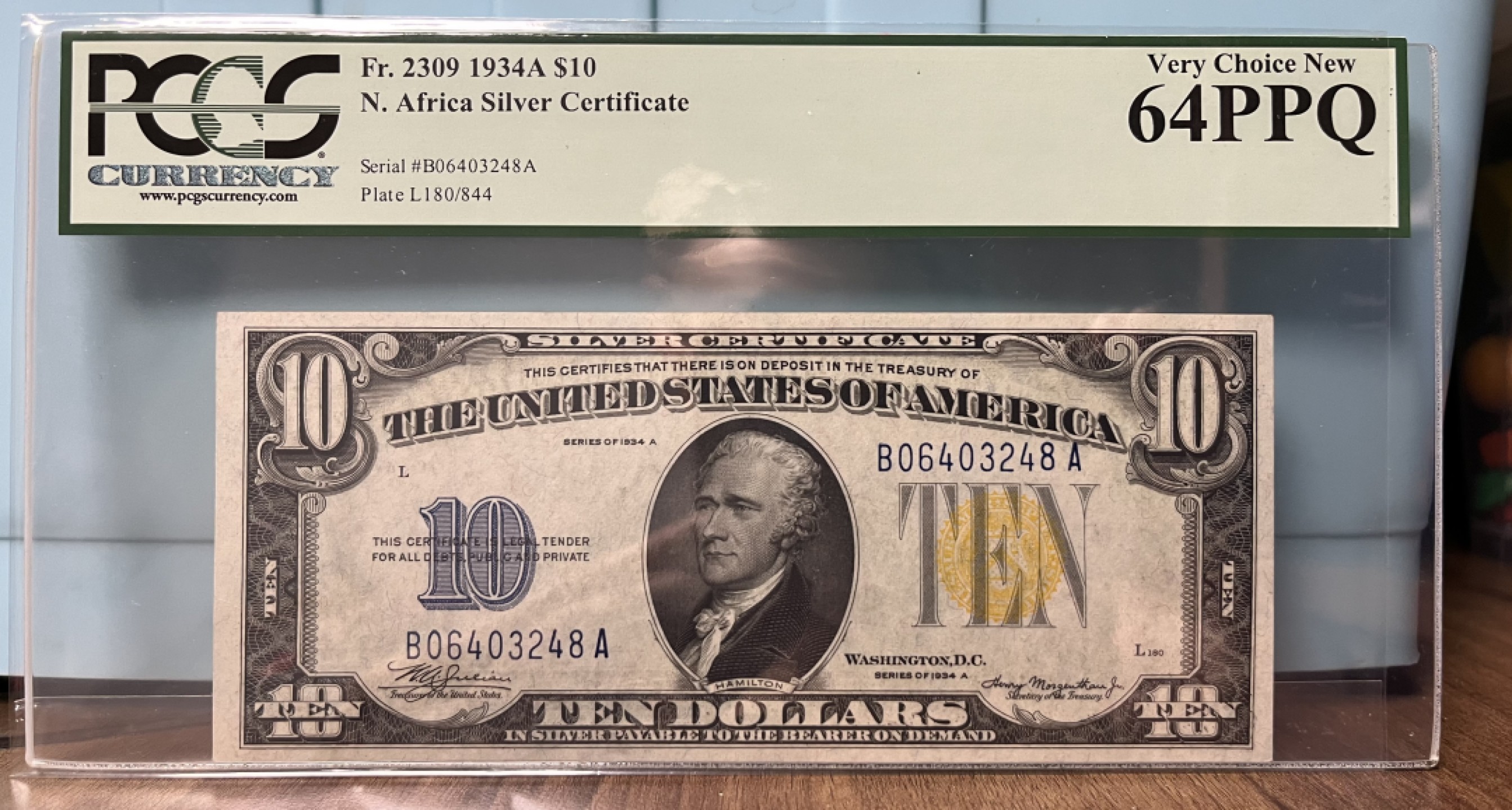 得物拍卖 Chase Auction  第2期 - -世界纸币精粹（二）  1934A 10美元 二战 北非券 WWII North Africa   PCGS 64PPQ，正面美国国父之一亚历山大·汉密尔顿，美国第一任财政部长，传奇精彩的一生，死于决斗！