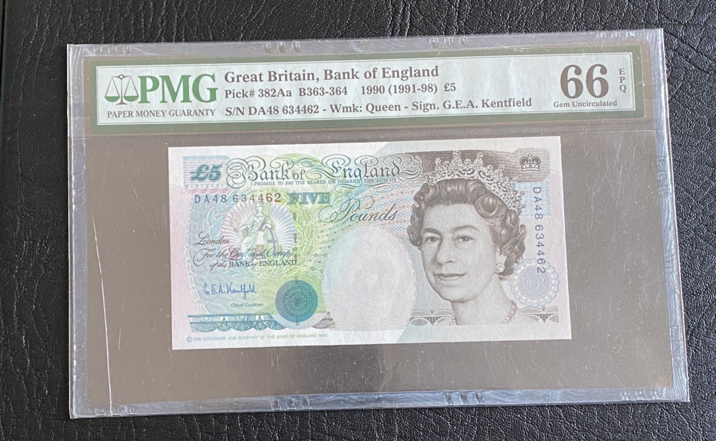 得物拍卖 Chase Auction  第2期 - -世界纸币精粹（二） 1990年英国E序列5镑，PMG66分，首发皇冠版！背面蒸汽机车发明者：乔治·斯蒂芬森。
