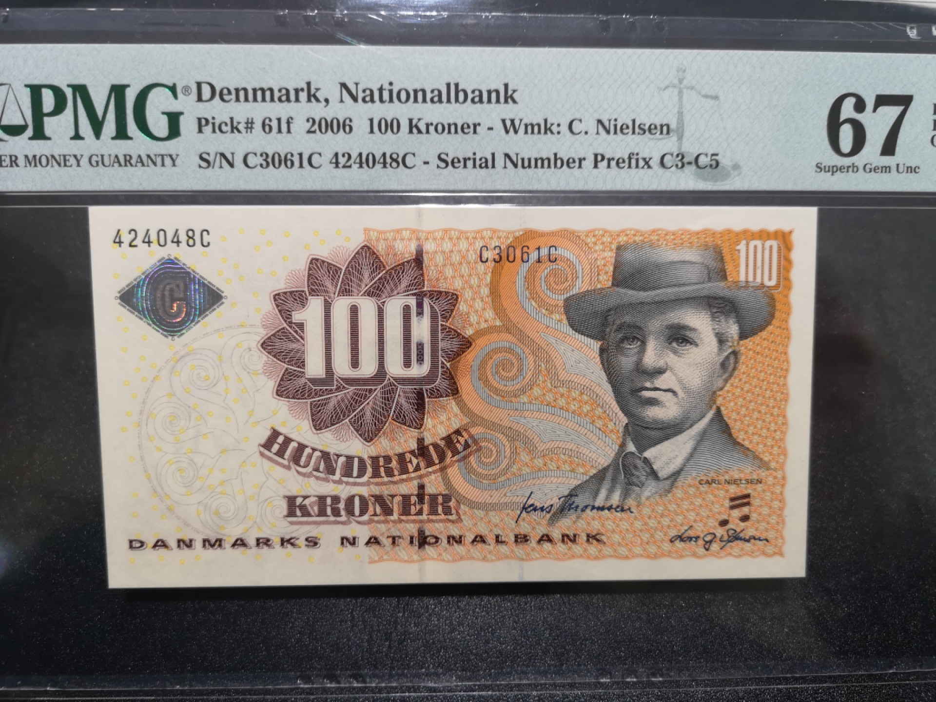 《外钞收藏家》第一百六十七期拍卖 2006年丹麦浮雕版100克朗 PMG67