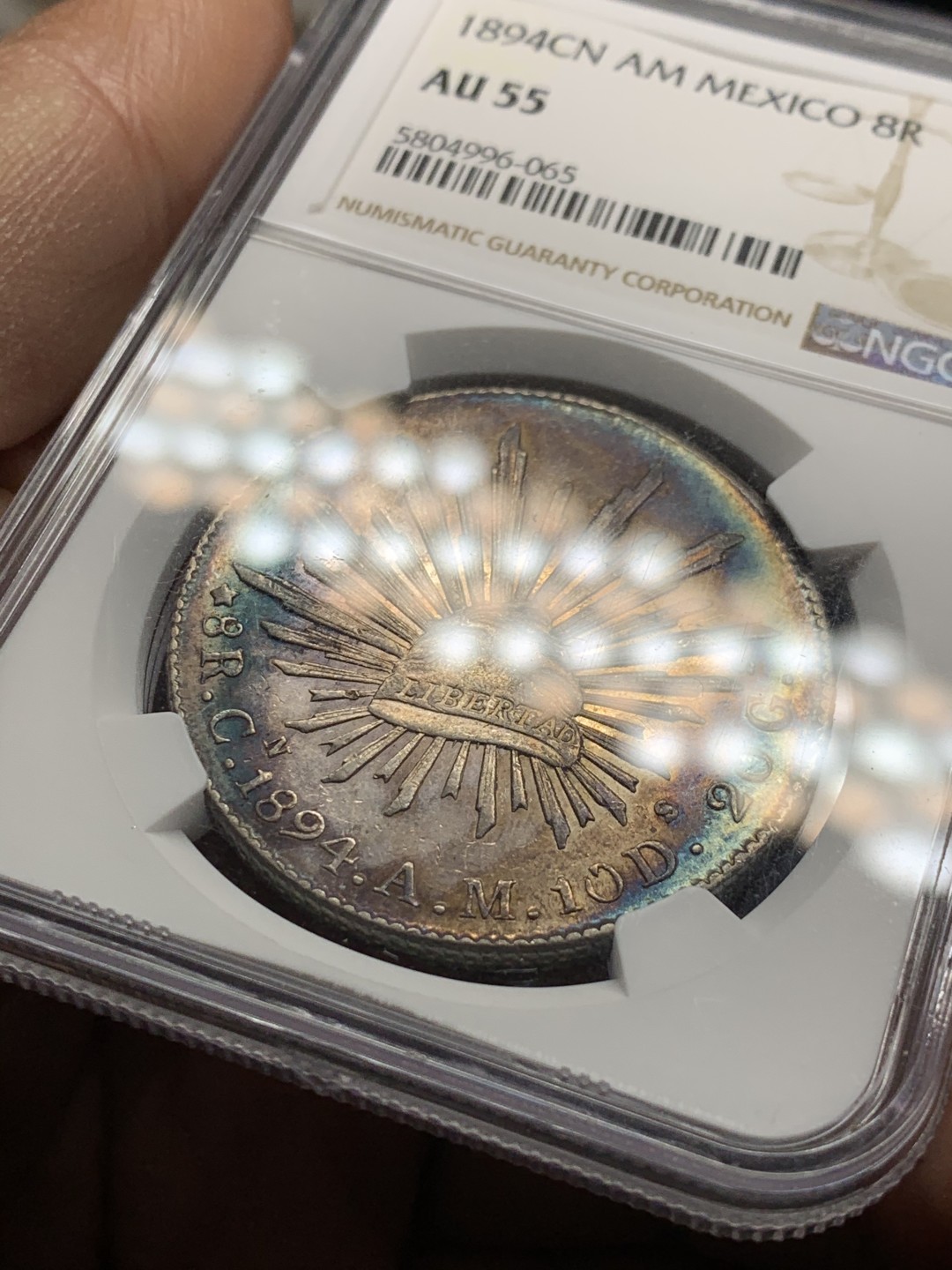 《竞宝斋》第34，35场-本周日，周一2场连拍（全场顺丰包邮） NGC-AU55 墨西哥 1894 花边鹰洋 原味带光五彩 极品五彩包浆