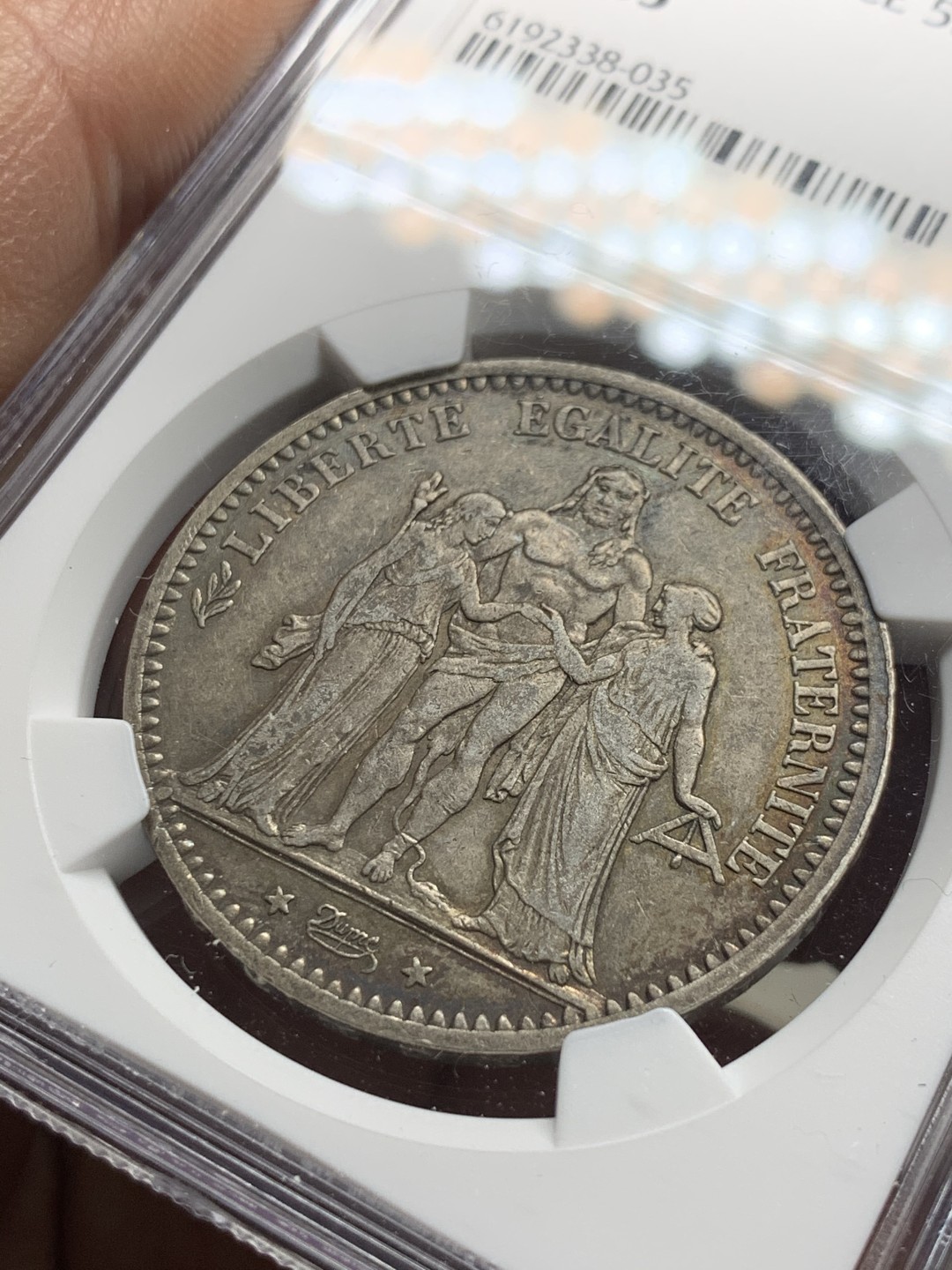 《竞宝斋》第34，35场-本周日，周一2场连拍（全场顺丰包邮） NGC-AU55 法国 1874年 大力神 5法郎 大银币 原味品