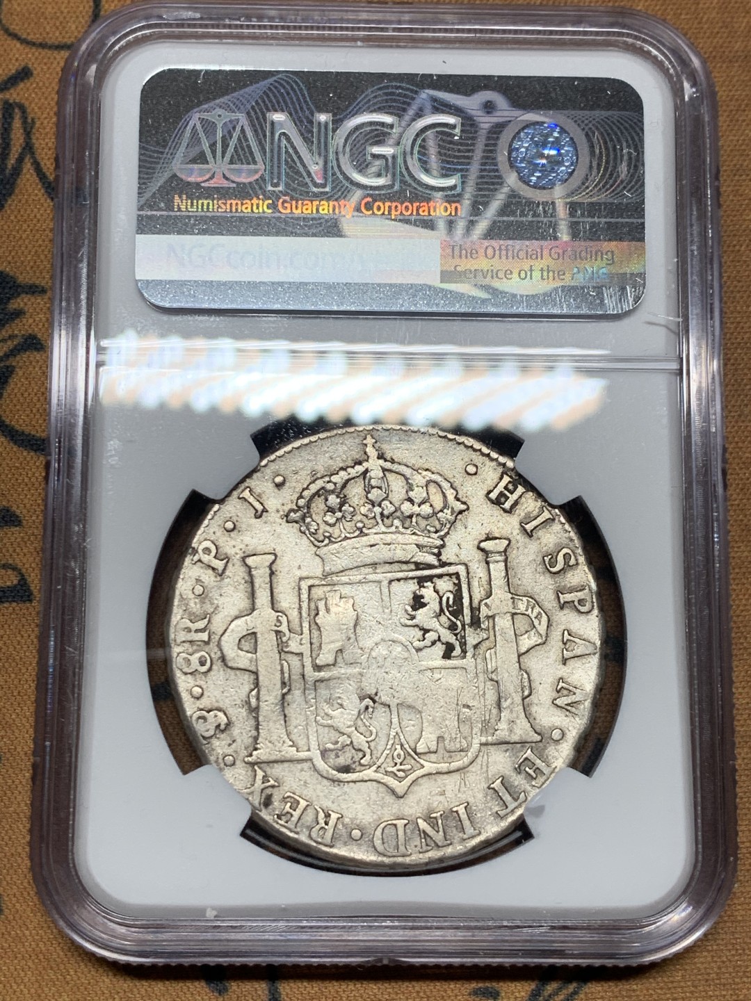 《竞宝斋》第34，35场-本周日，周一2场连拍（全场顺丰包邮） NGC 评级 玻利维亚 1808年 卡四 8里亚尔 双柱银币